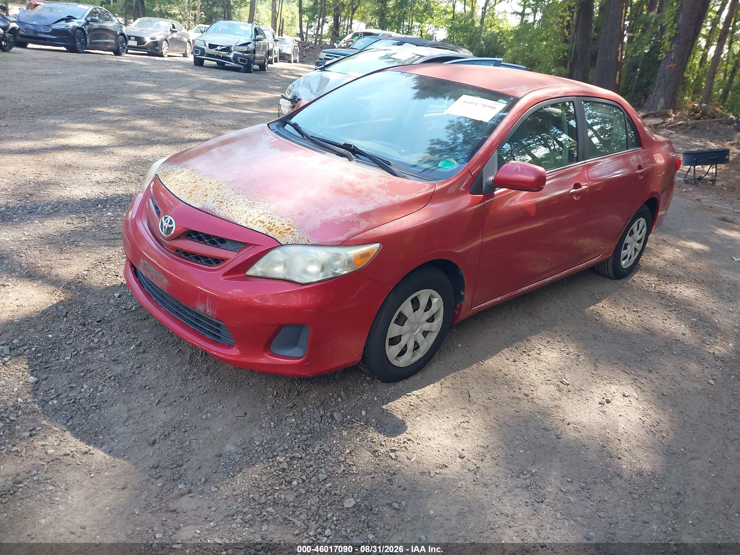 2011 Toyota Corolla Le Red vin: JTDBU4EE3BJ098852