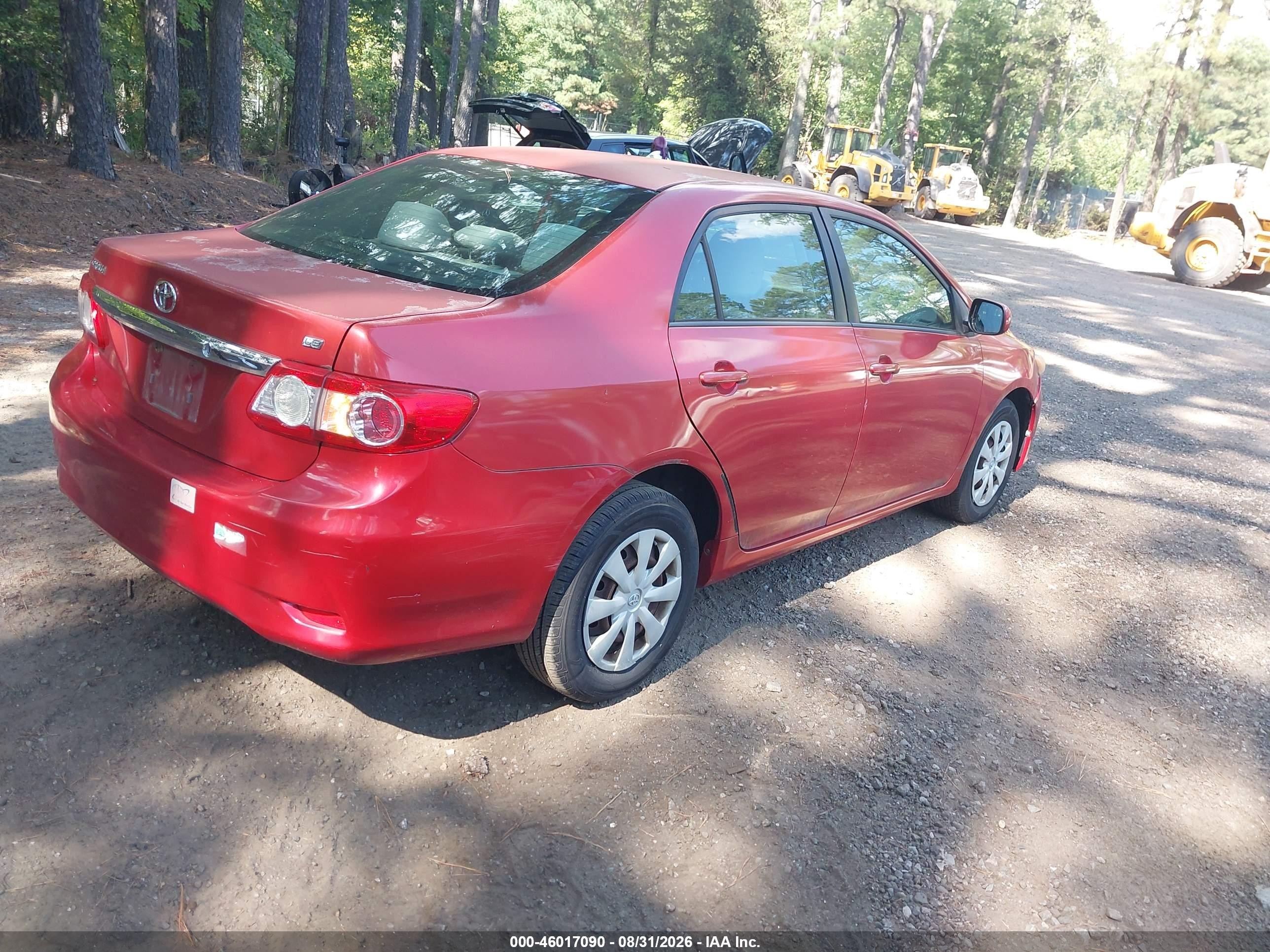 2011 Toyota Corolla Le Red vin: JTDBU4EE3BJ098852