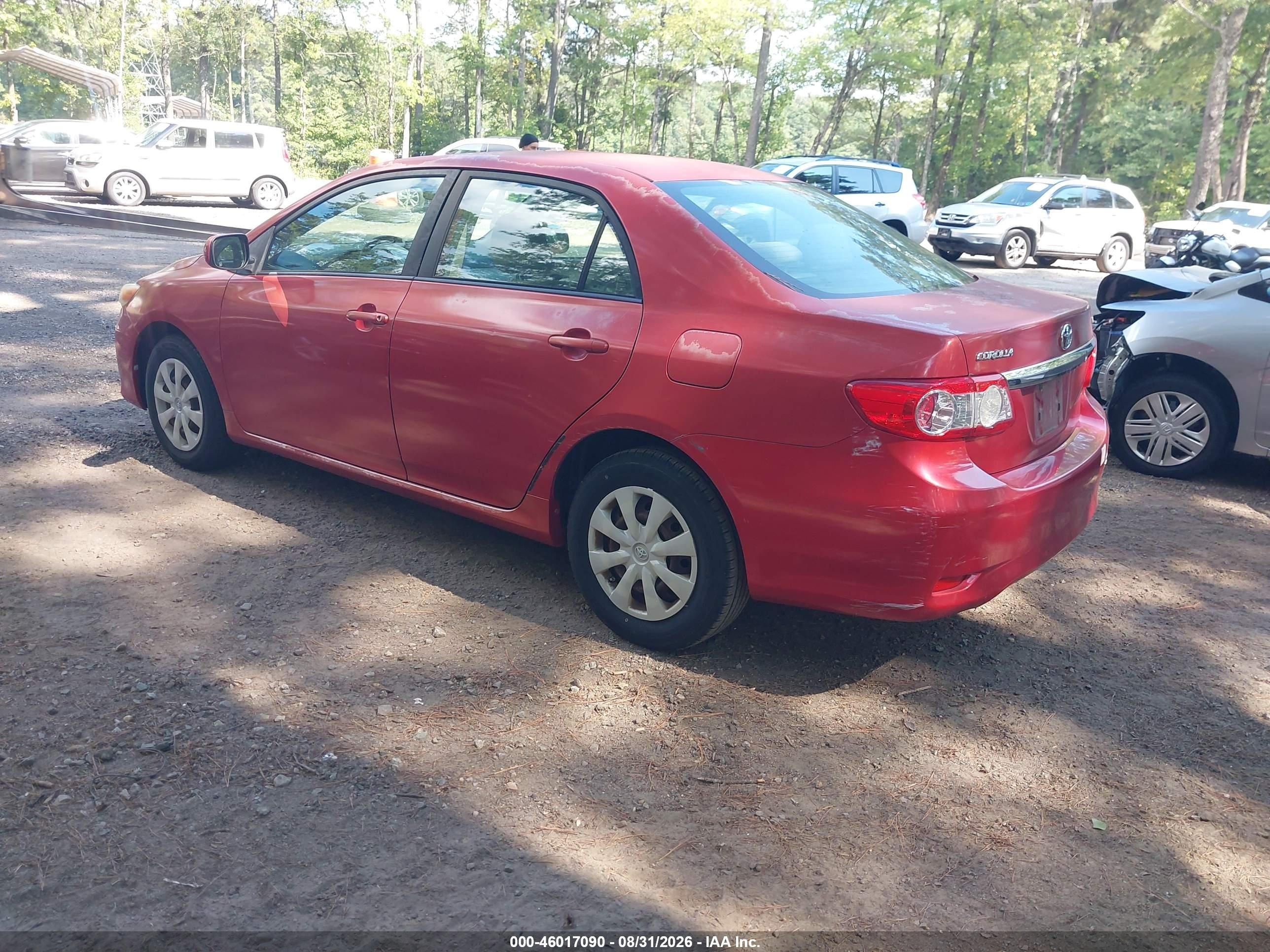 2011 Toyota Corolla Le Red vin: JTDBU4EE3BJ098852