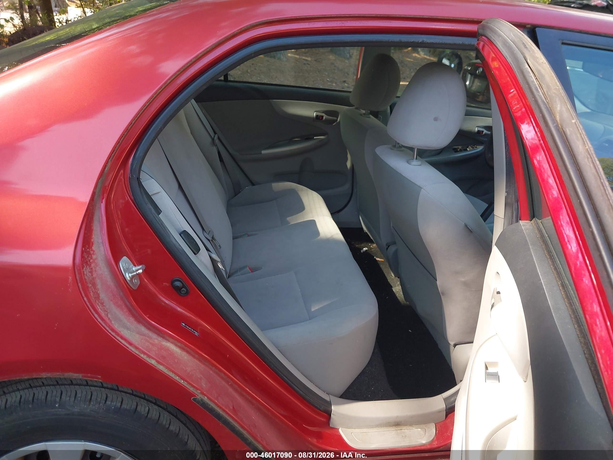 2011 Toyota Corolla Le Red vin: JTDBU4EE3BJ098852