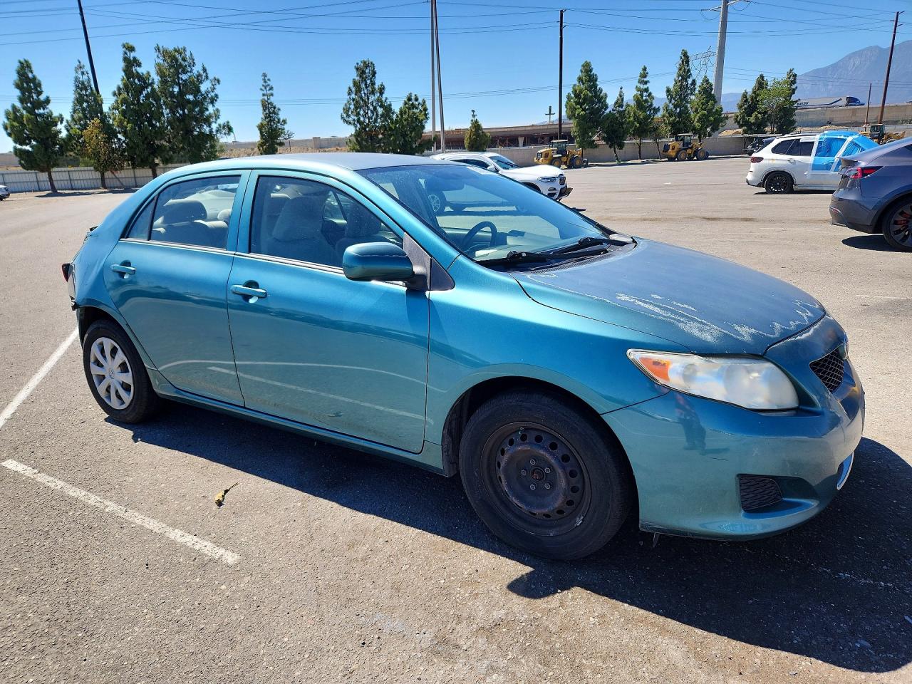 2010 Toyota Corolla Base Teal vin: JTDBU4EE4A9114752