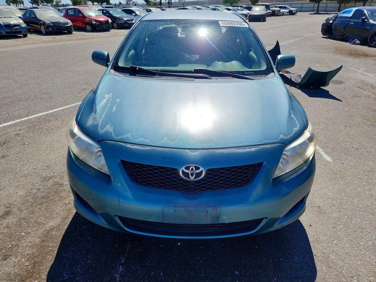 2010 Toyota Corolla Base Teal vin: JTDBU4EE4A9114752