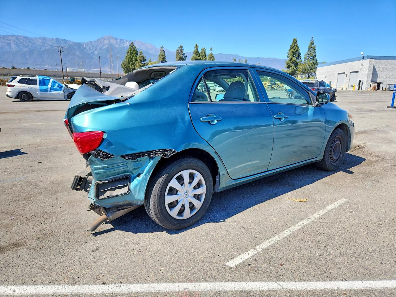 2010 Toyota Corolla Base Teal vin: JTDBU4EE4A9114752