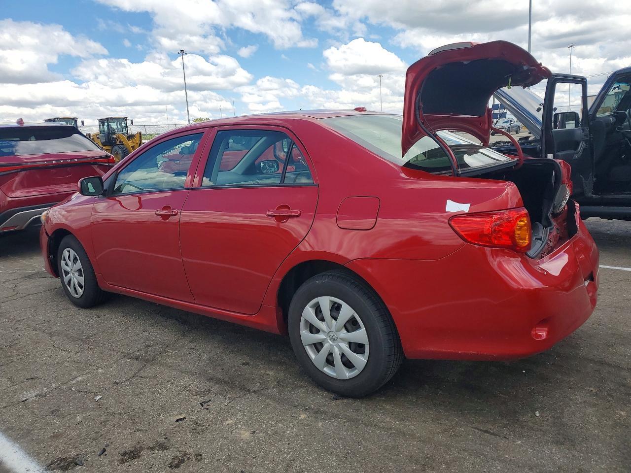 2010 Toyota Corolla Le Red vin: JTDBU4EE4AJ070539