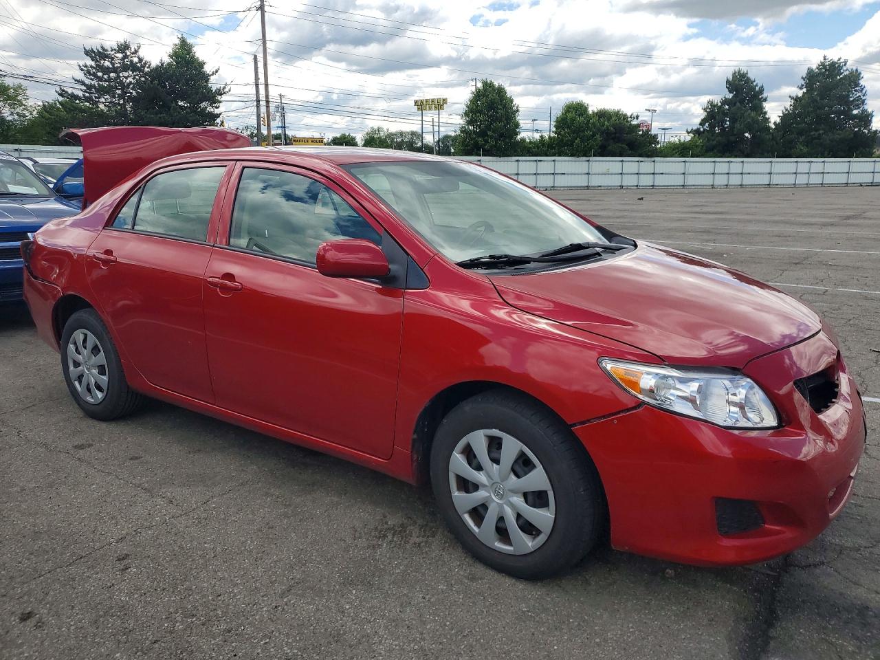 2010 Toyota Corolla Le Red vin: JTDBU4EE4AJ070539