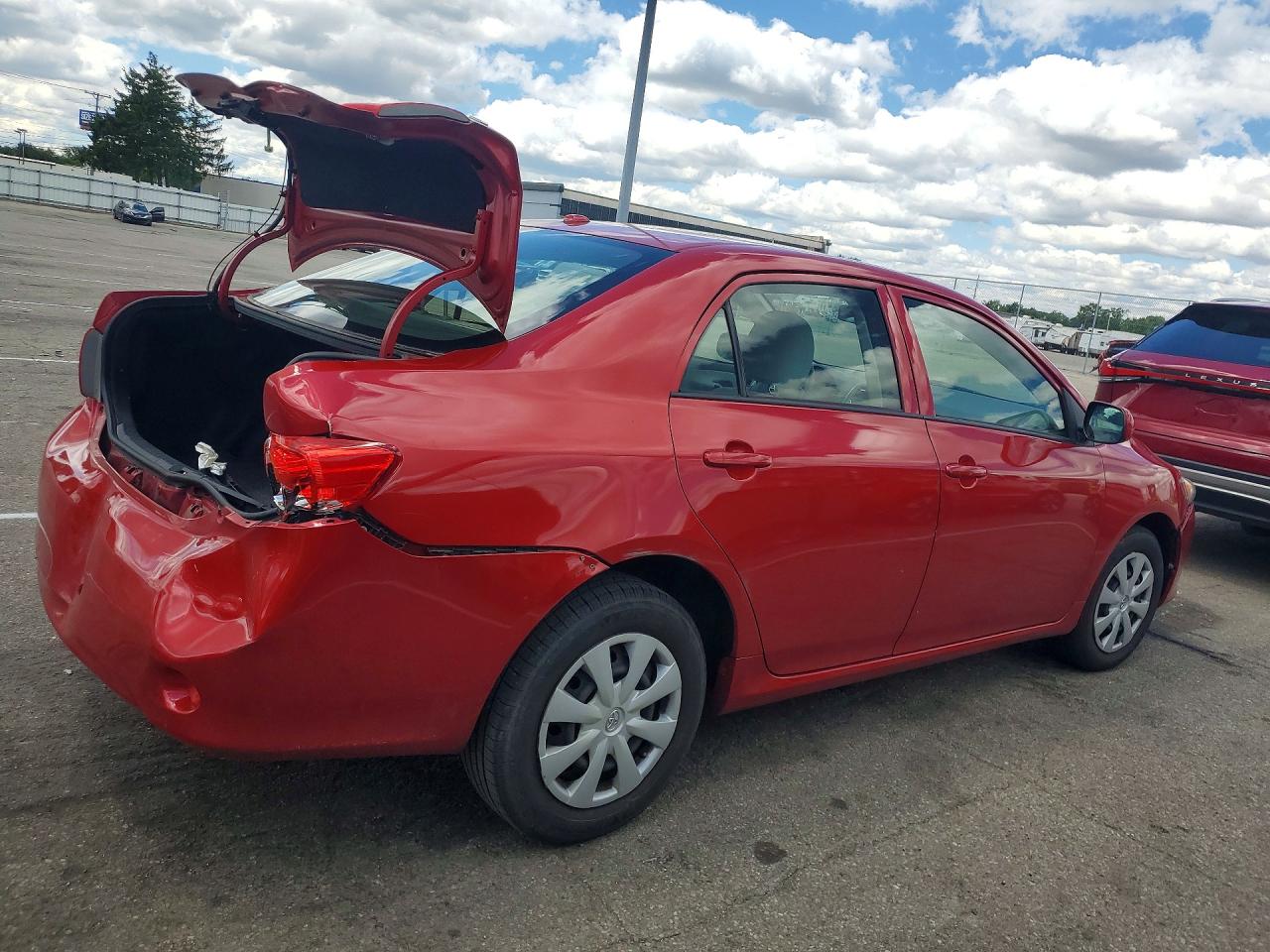 2010 Toyota Corolla Le Red vin: JTDBU4EE4AJ070539