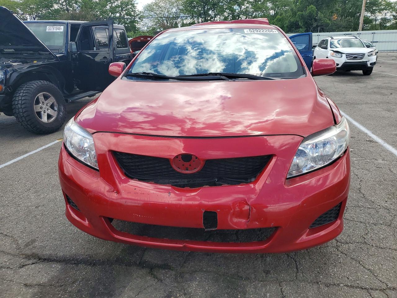 2010 Toyota Corolla Le Red vin: JTDBU4EE4AJ070539