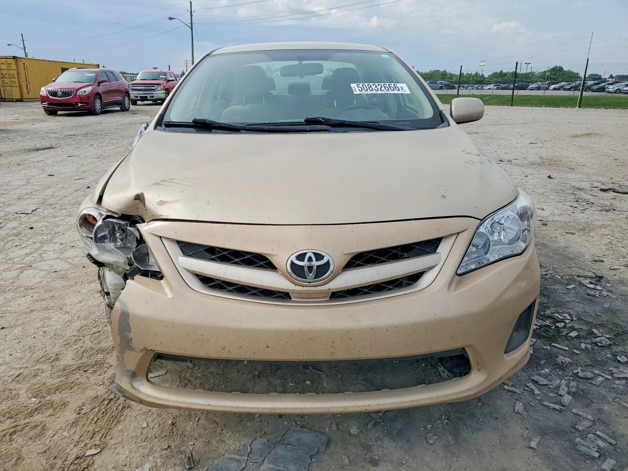 2011 Toyota Corolla Le Gold vin: JTDBU4EE4B9131584