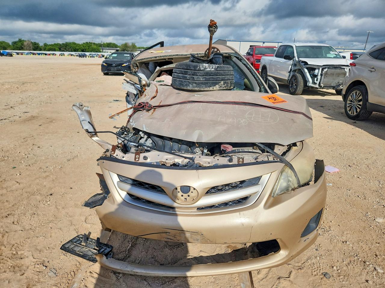 2012 Toyota Corolla Le Beige vin: JTDBU4EE4C9171696