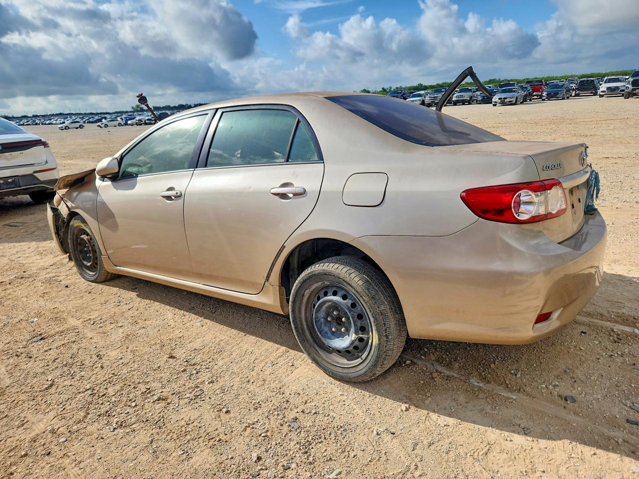 2012 Toyota Corolla Le Beige vin: JTDBU4EE4C9171696