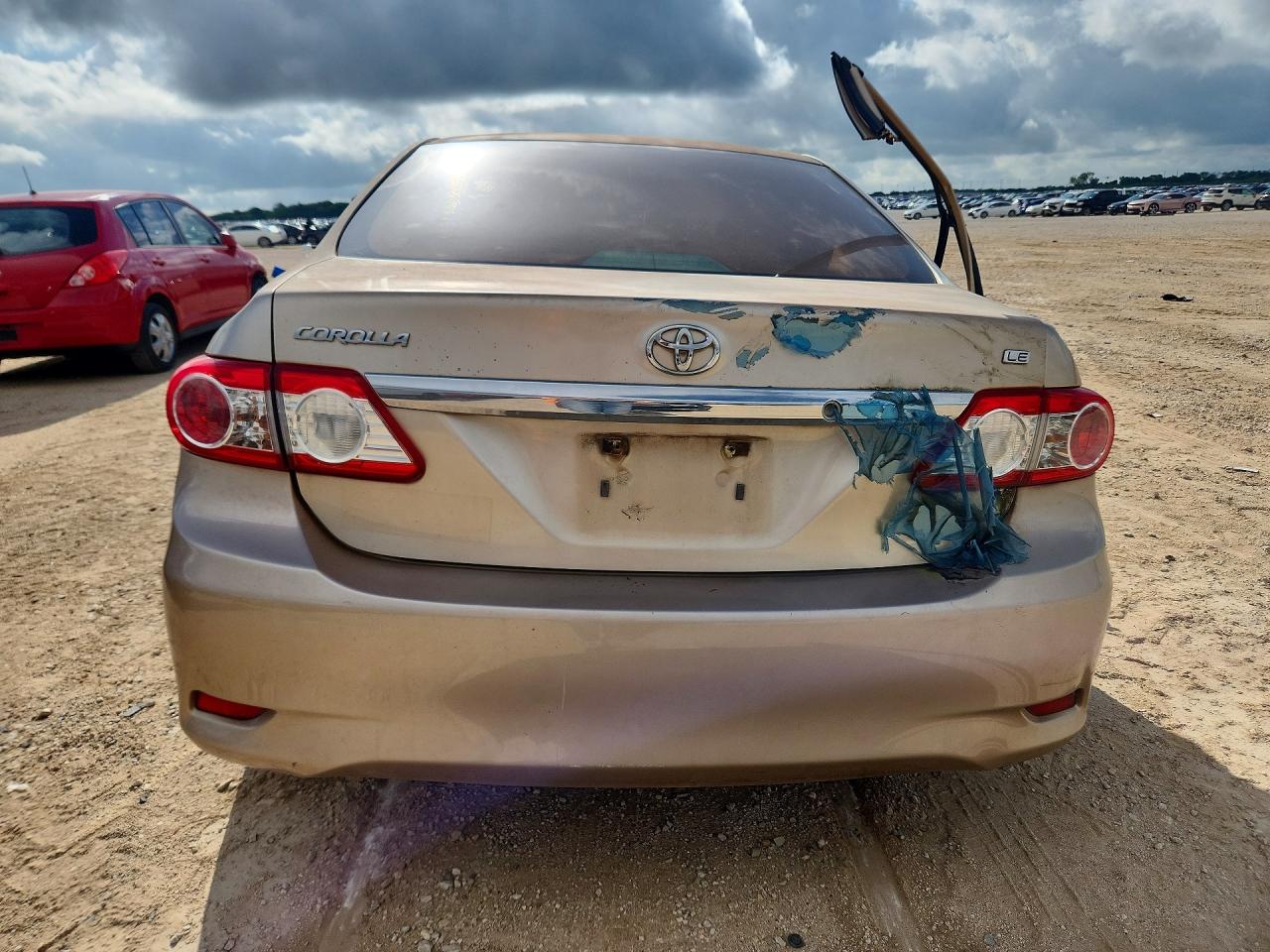 2012 Toyota Corolla Le Beige vin: JTDBU4EE4C9171696