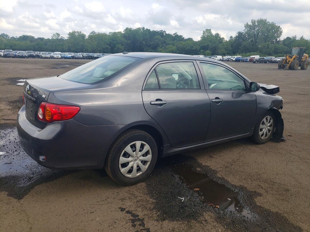 2010 Toyota Corolla Le Gray vin: JTDBU4EE5A9100018