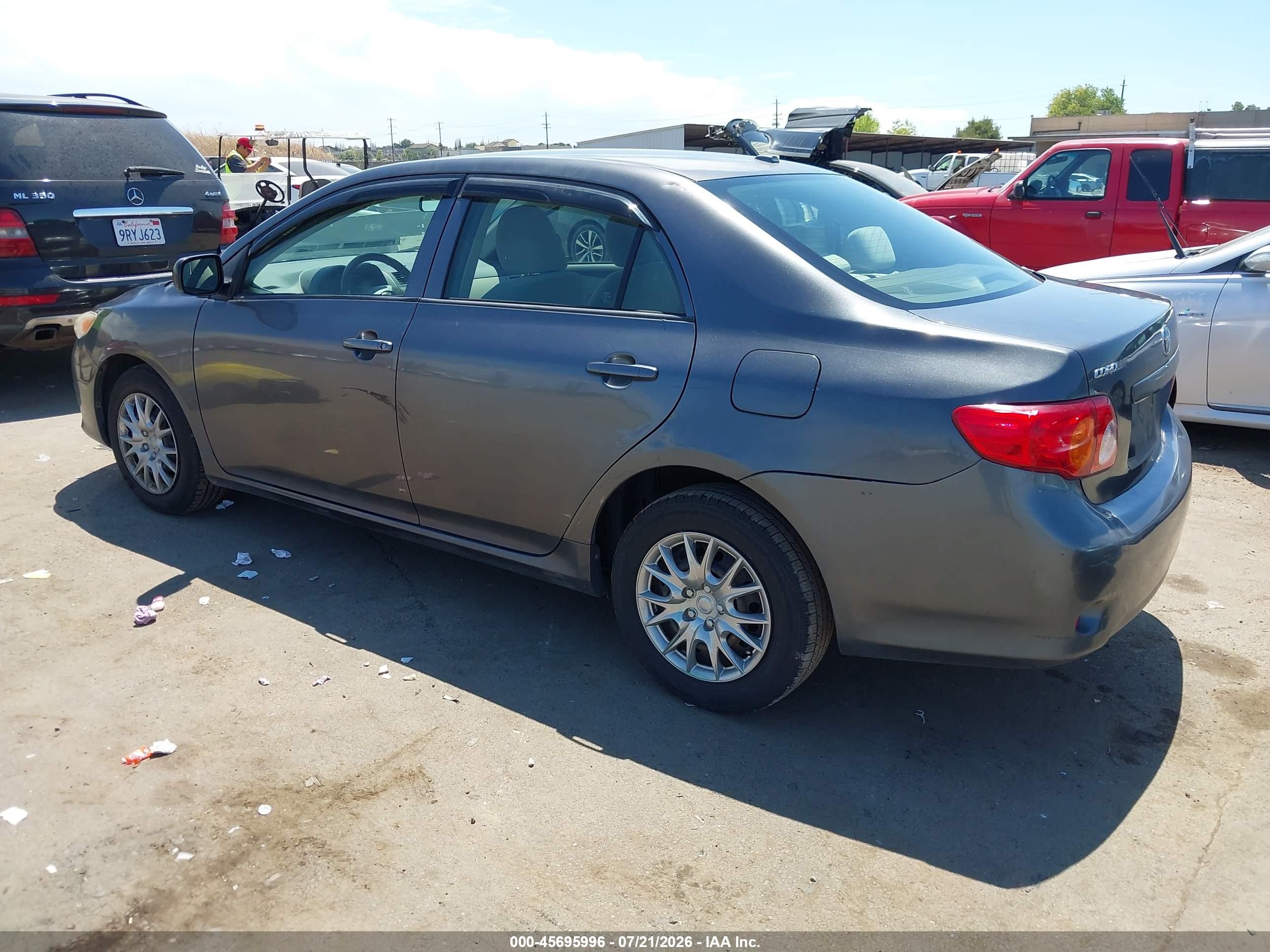 2010 Toyota Corolla Le Gray vin: JTDBU4EE5AJ059890