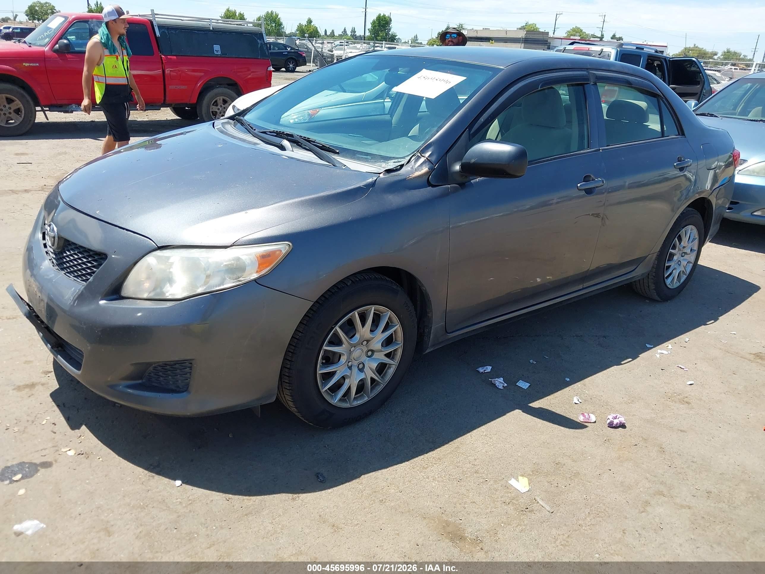 2010 Toyota Corolla Le Gray vin: JTDBU4EE5AJ059890