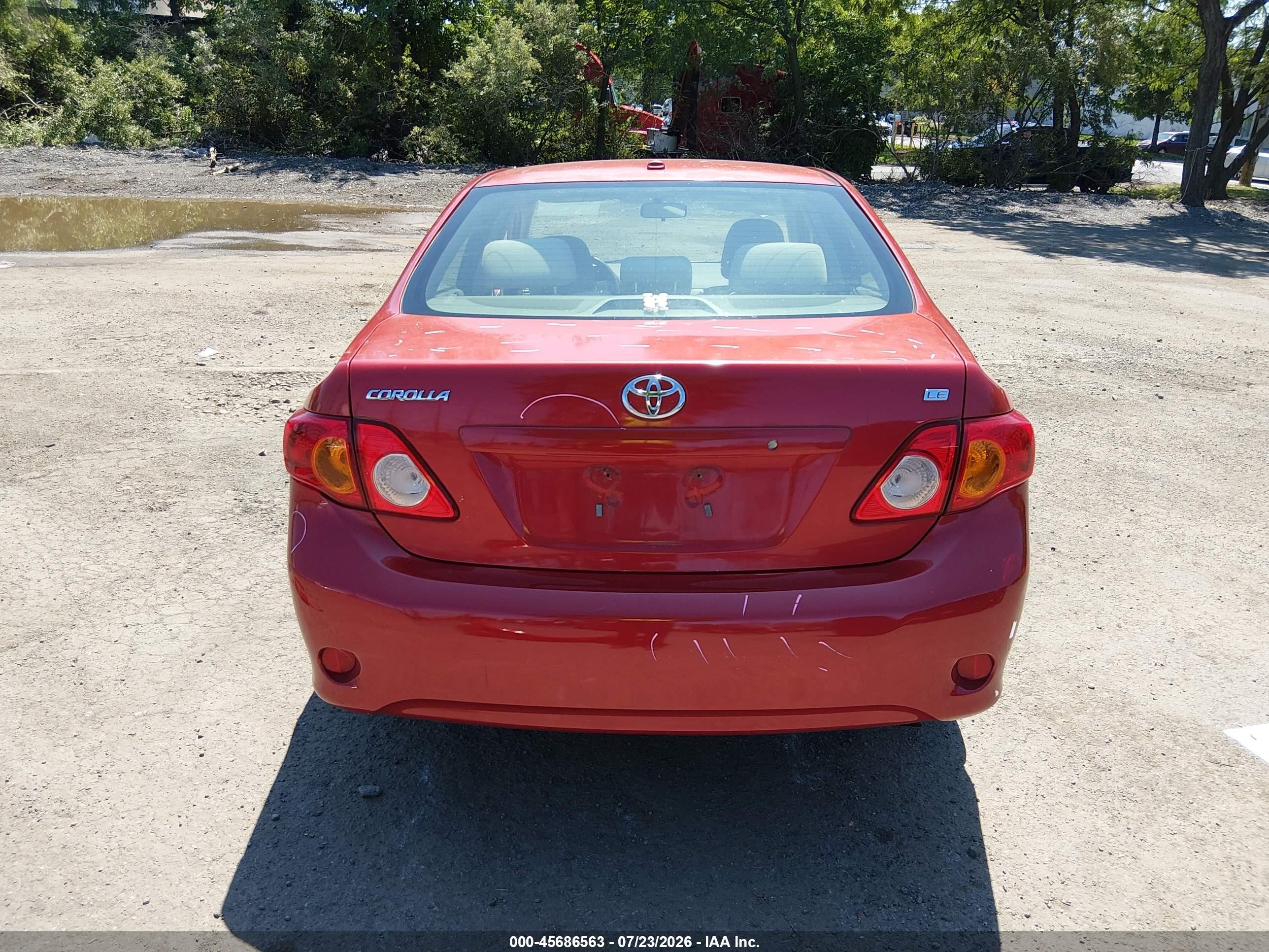 2010 Toyota Corolla Le Red vin: JTDBU4EE5AJ073708