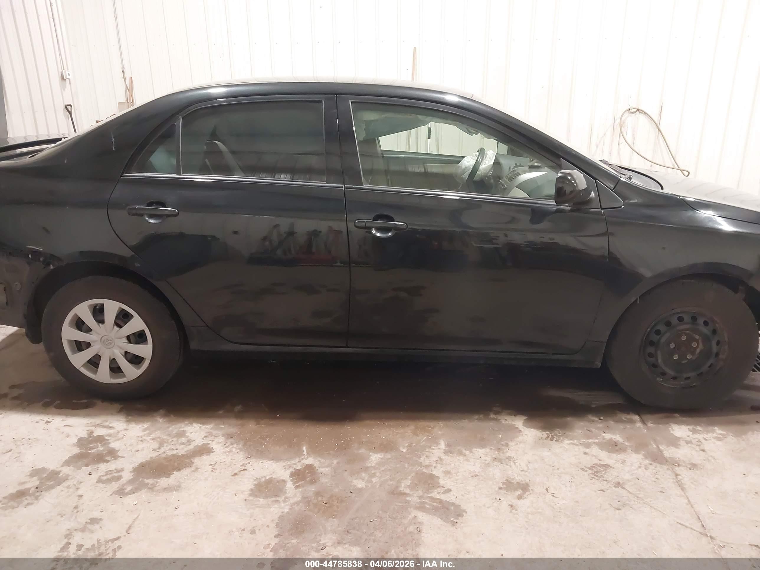 2011 Toyota Corolla Le Black vin: JTDBU4EE5B9138057