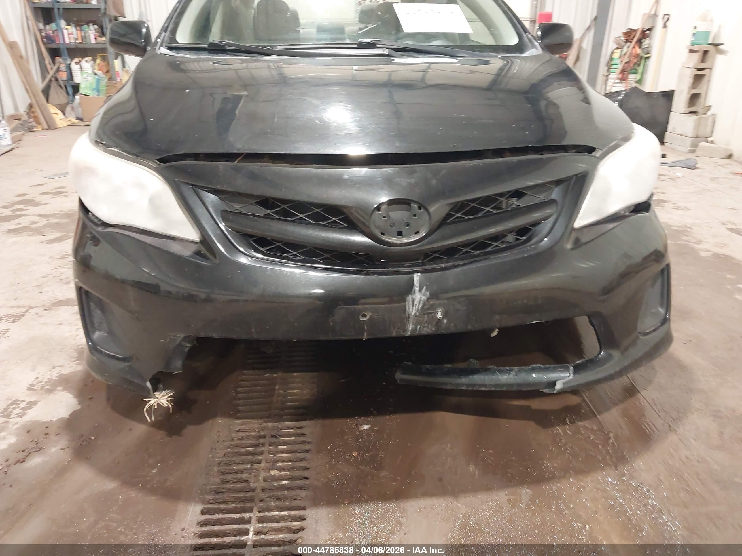 2011 Toyota Corolla Le Black vin: JTDBU4EE5B9138057