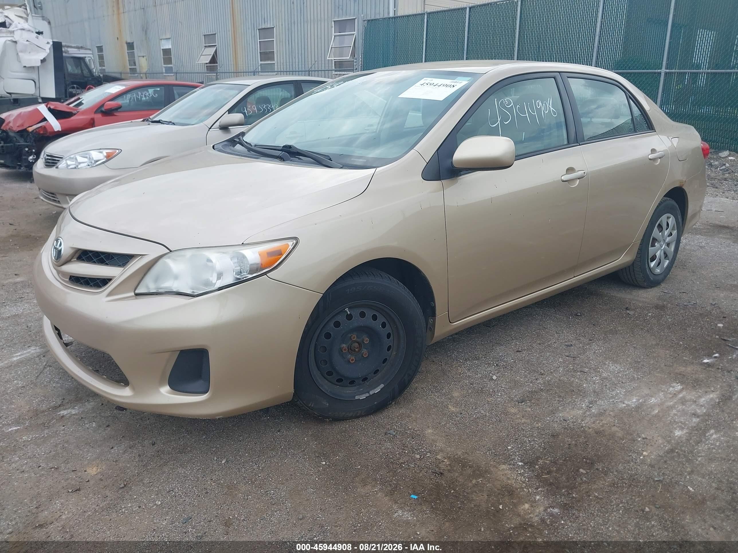 2011 Toyota Corolla Le Gold vin: JTDBU4EE5B9144943