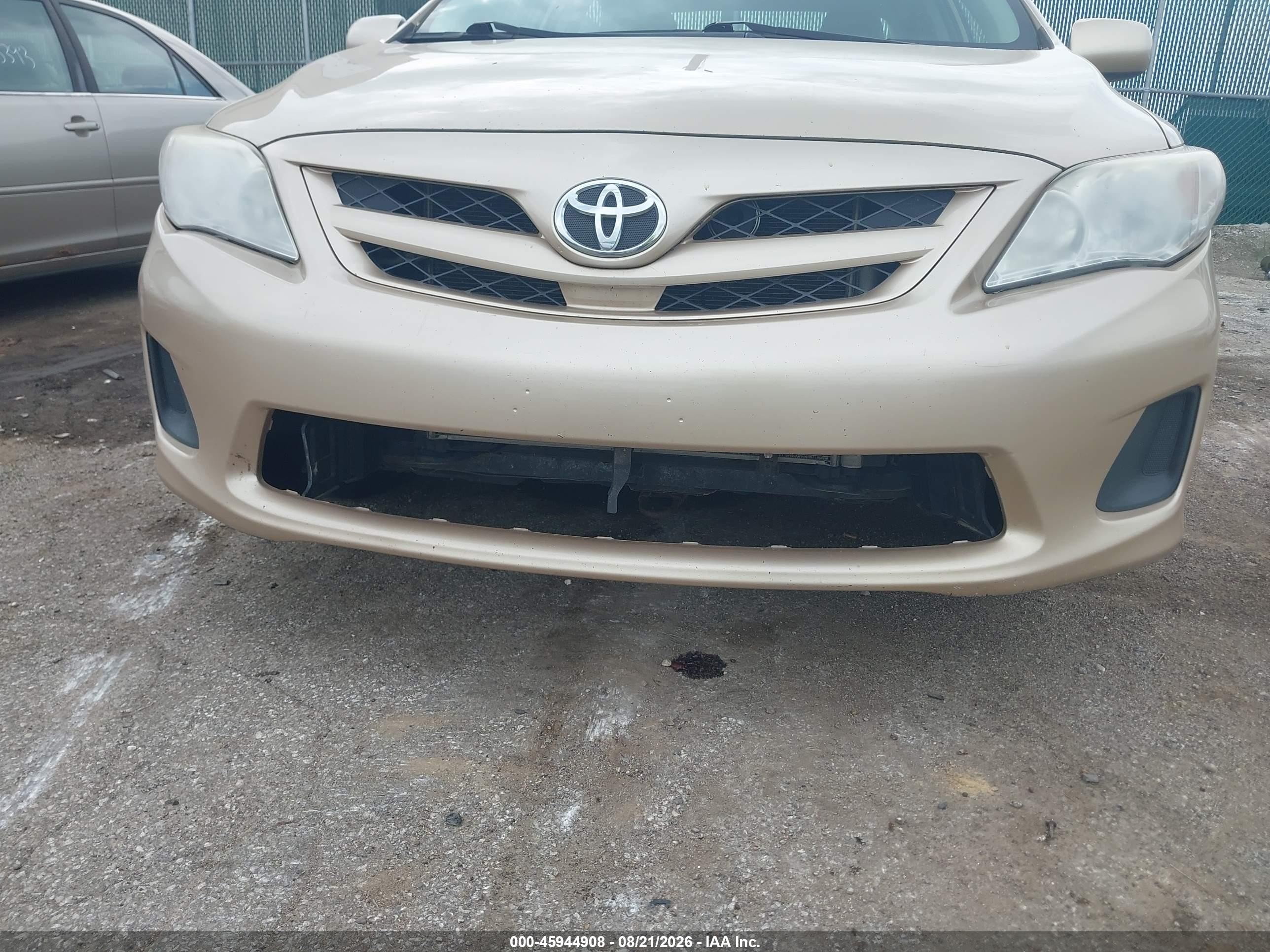 2011 Toyota Corolla Le Gold vin: JTDBU4EE5B9144943