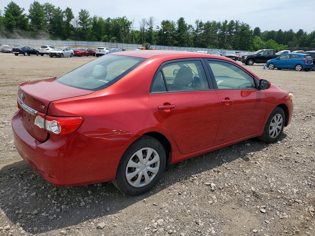 2011 Toyota Corolla Le Red vin: JTDBU4EE5B9155800