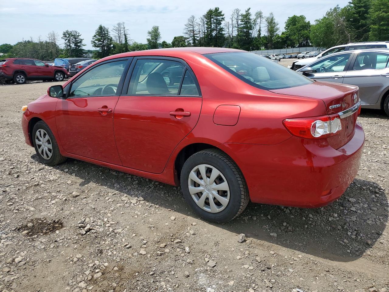 2011 Toyota Corolla Le Red vin: JTDBU4EE5B9155800