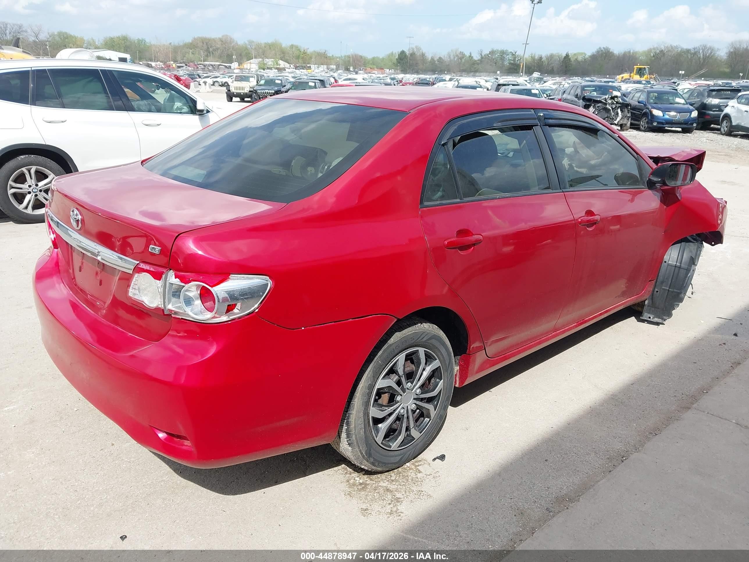 2011 Toyota Corolla Le Red vin: JTDBU4EE5B9160768