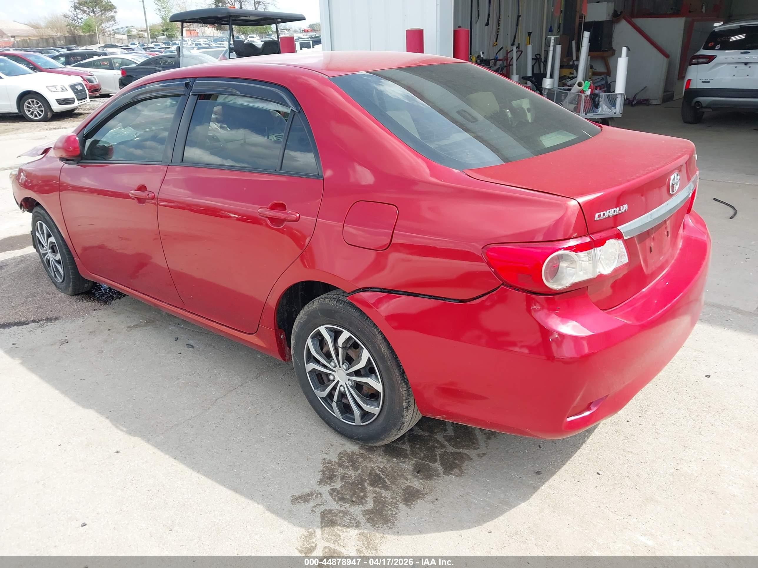 2011 Toyota Corolla Le Red vin: JTDBU4EE5B9160768