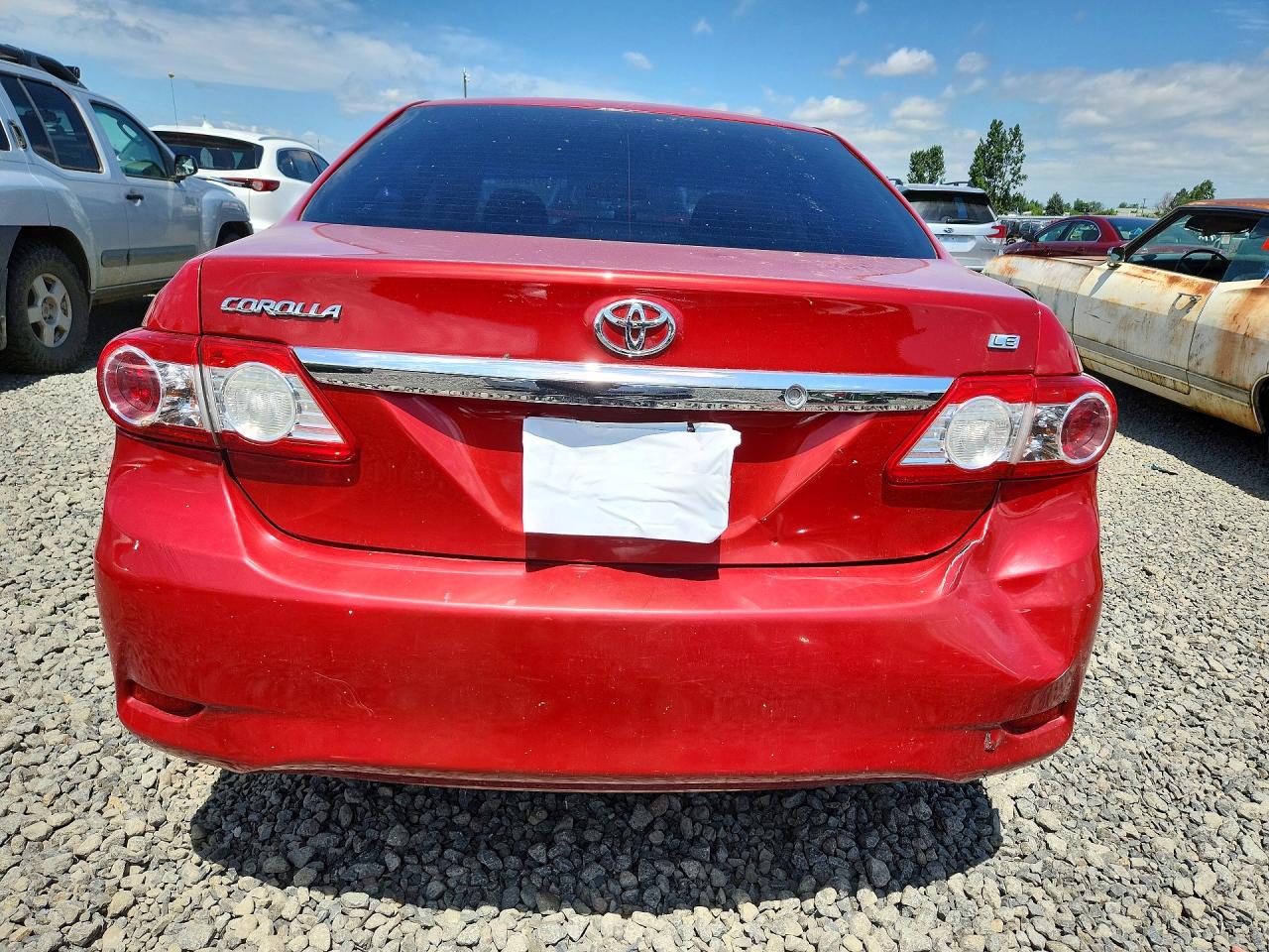 2011 Toyota Corolla Le Red vin: JTDBU4EE5B9161323