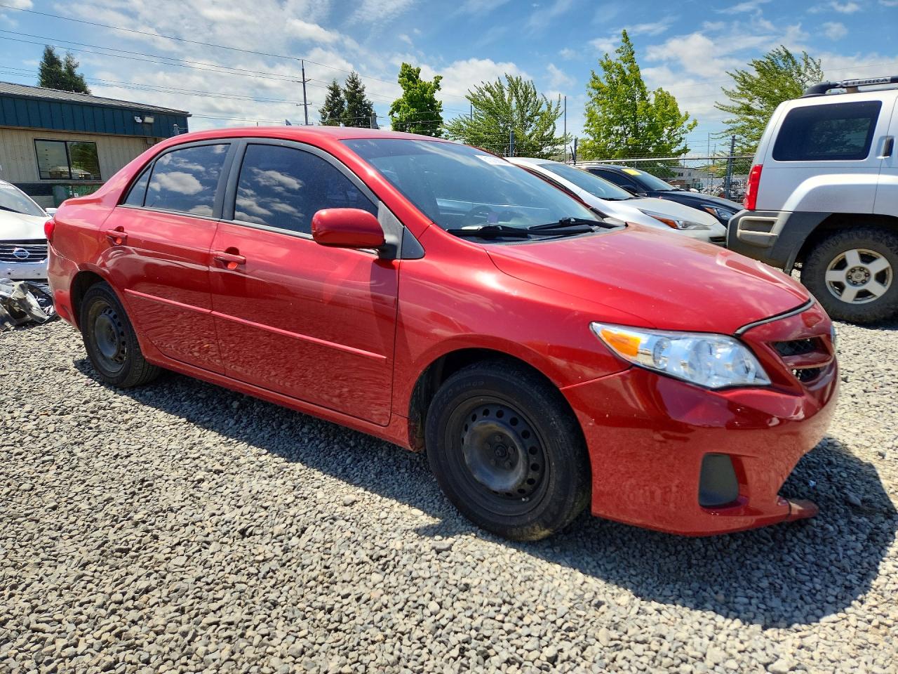 2011 Toyota Corolla Le Red vin: JTDBU4EE5B9161323