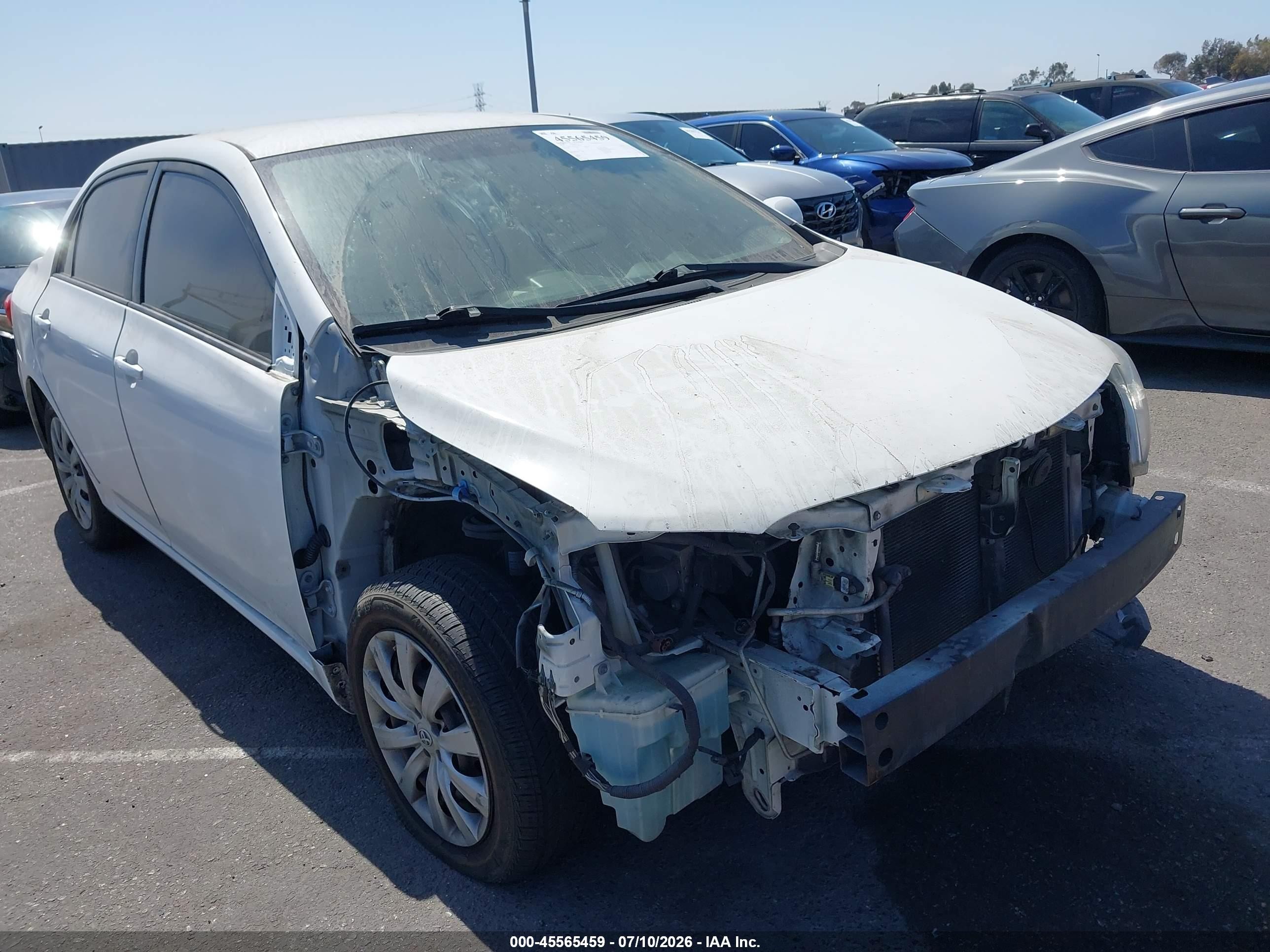2012 Toyota Corolla Le White vin: JTDBU4EE5C9169875