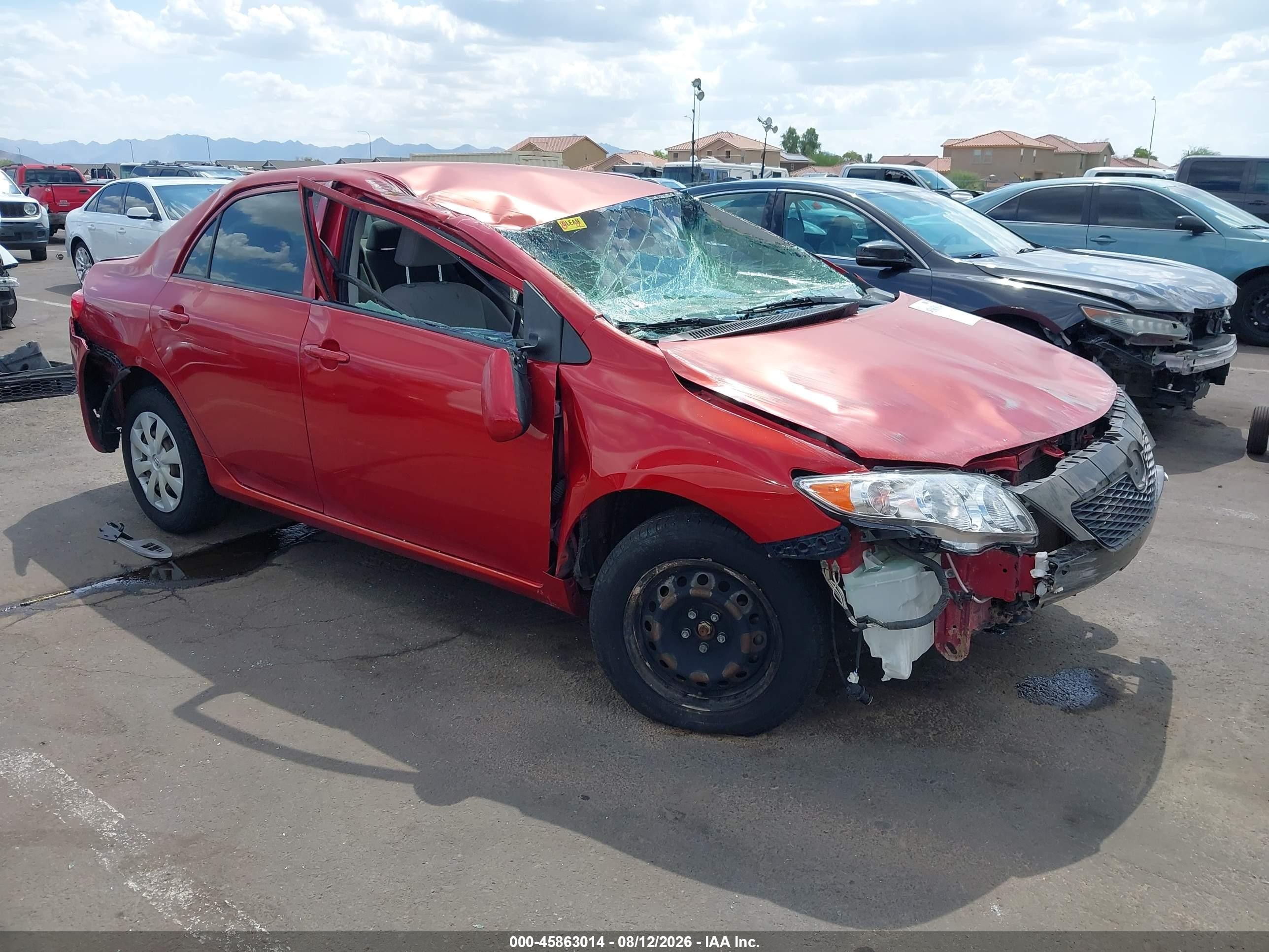 2010 Toyota Corolla Le Red vin: JTDBU4EE6A9106944