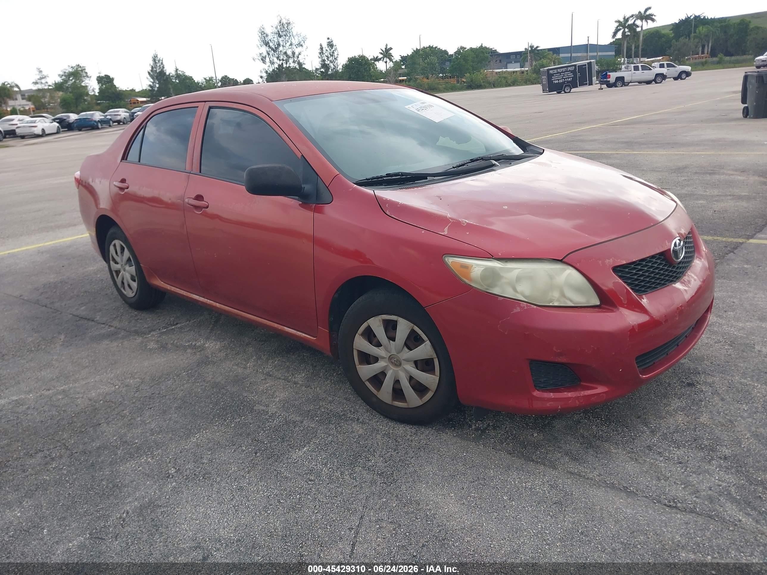 2010 Toyota Corolla Le Red vin: JTDBU4EE6A9111626