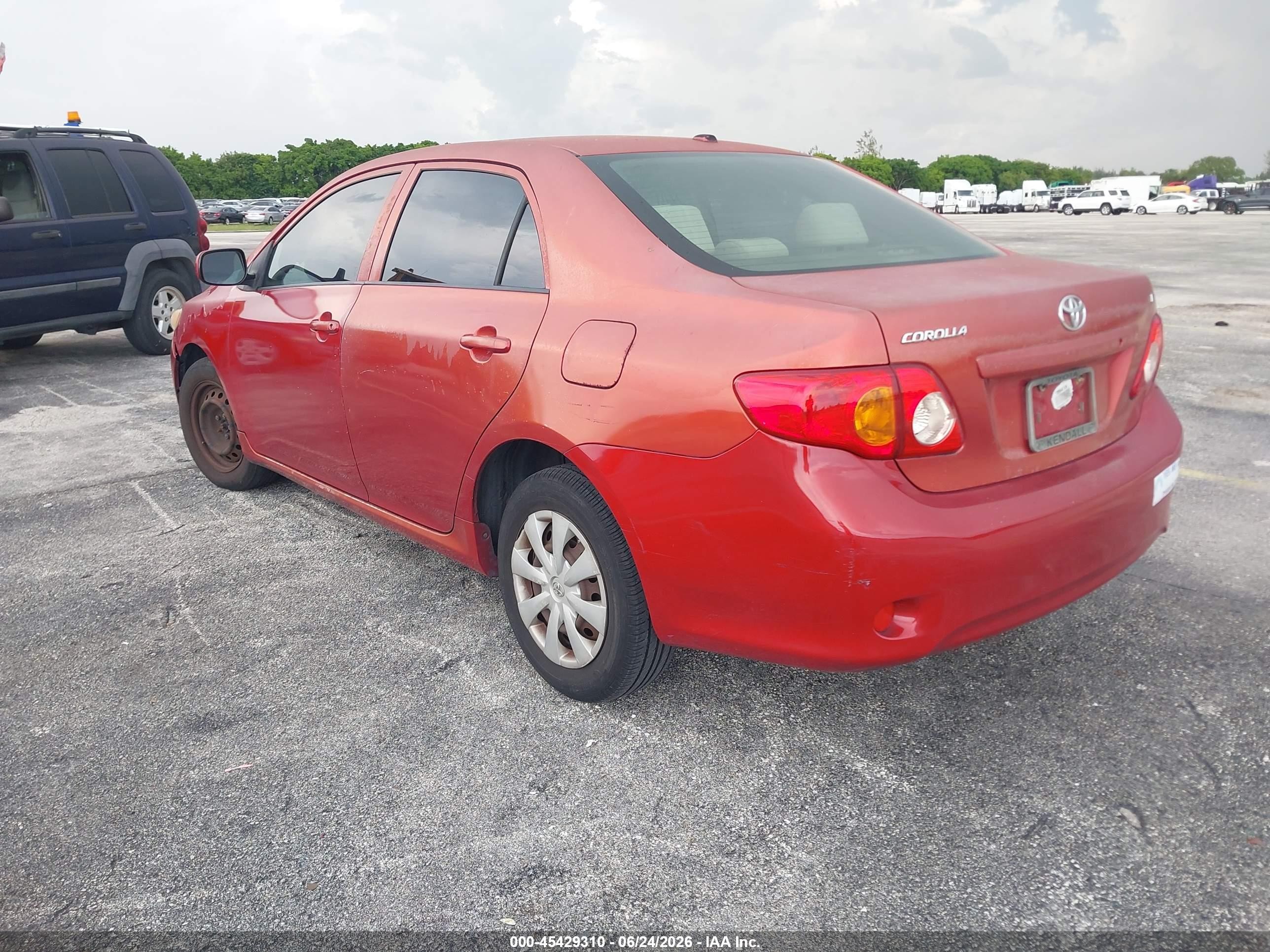 2010 Toyota Corolla Le Red vin: JTDBU4EE6A9111626