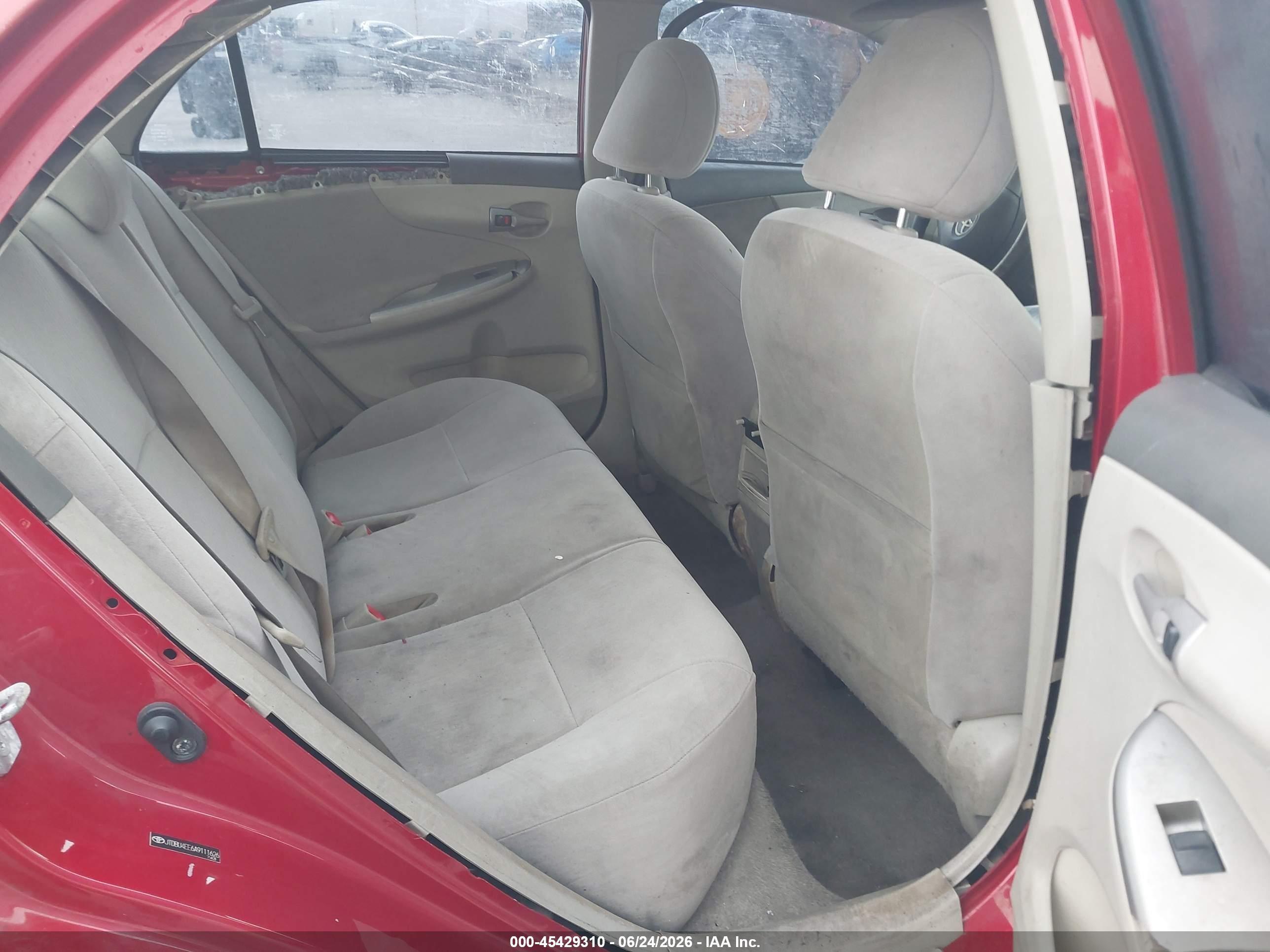 2010 Toyota Corolla Le Red vin: JTDBU4EE6A9111626