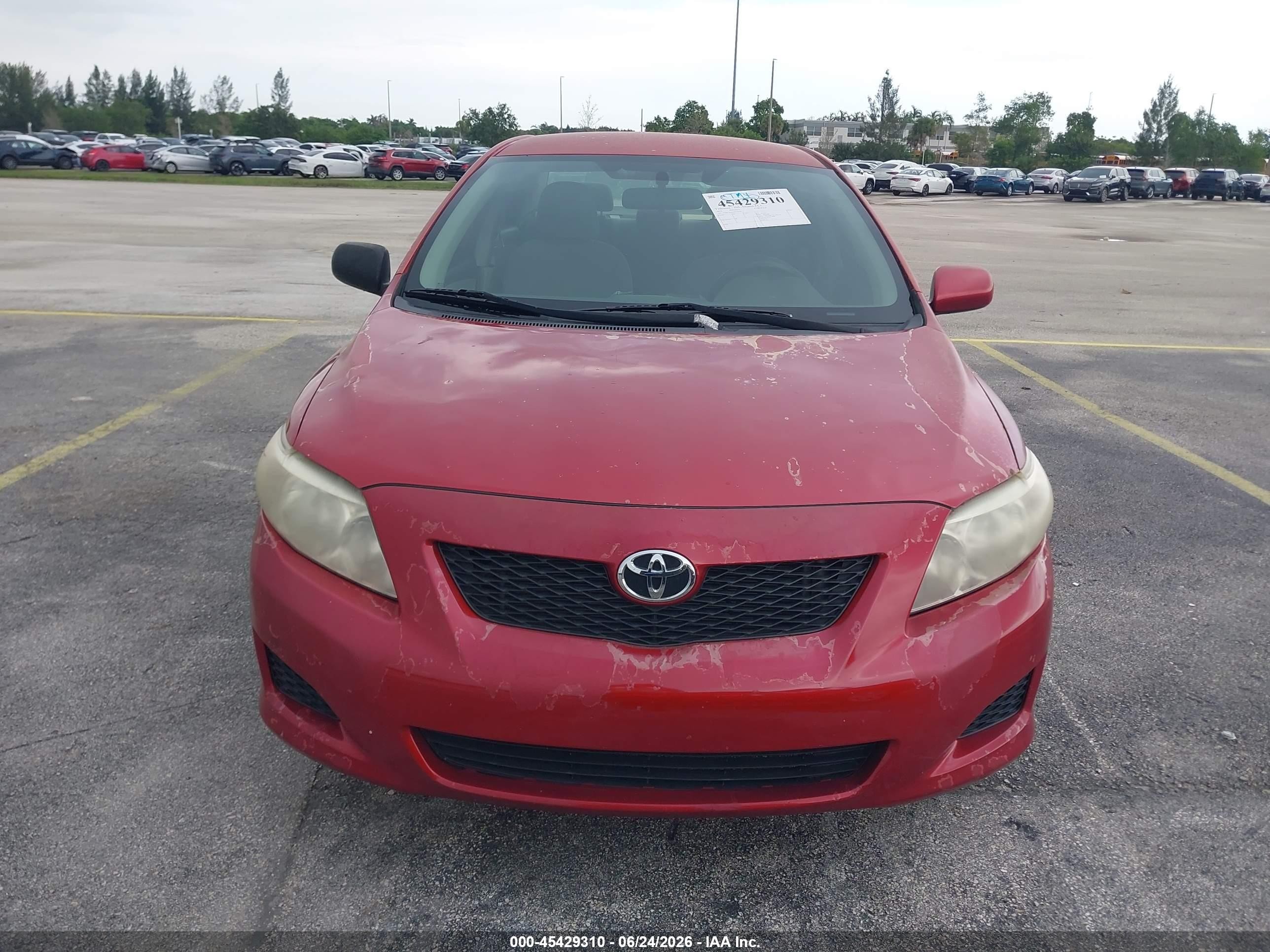 2010 Toyota Corolla Le Red vin: JTDBU4EE6A9111626
