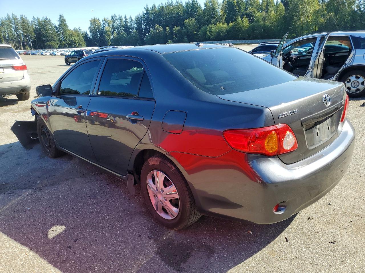 2010 Toyota Corolla Le Gray vin: JTDBU4EE6AJ059574