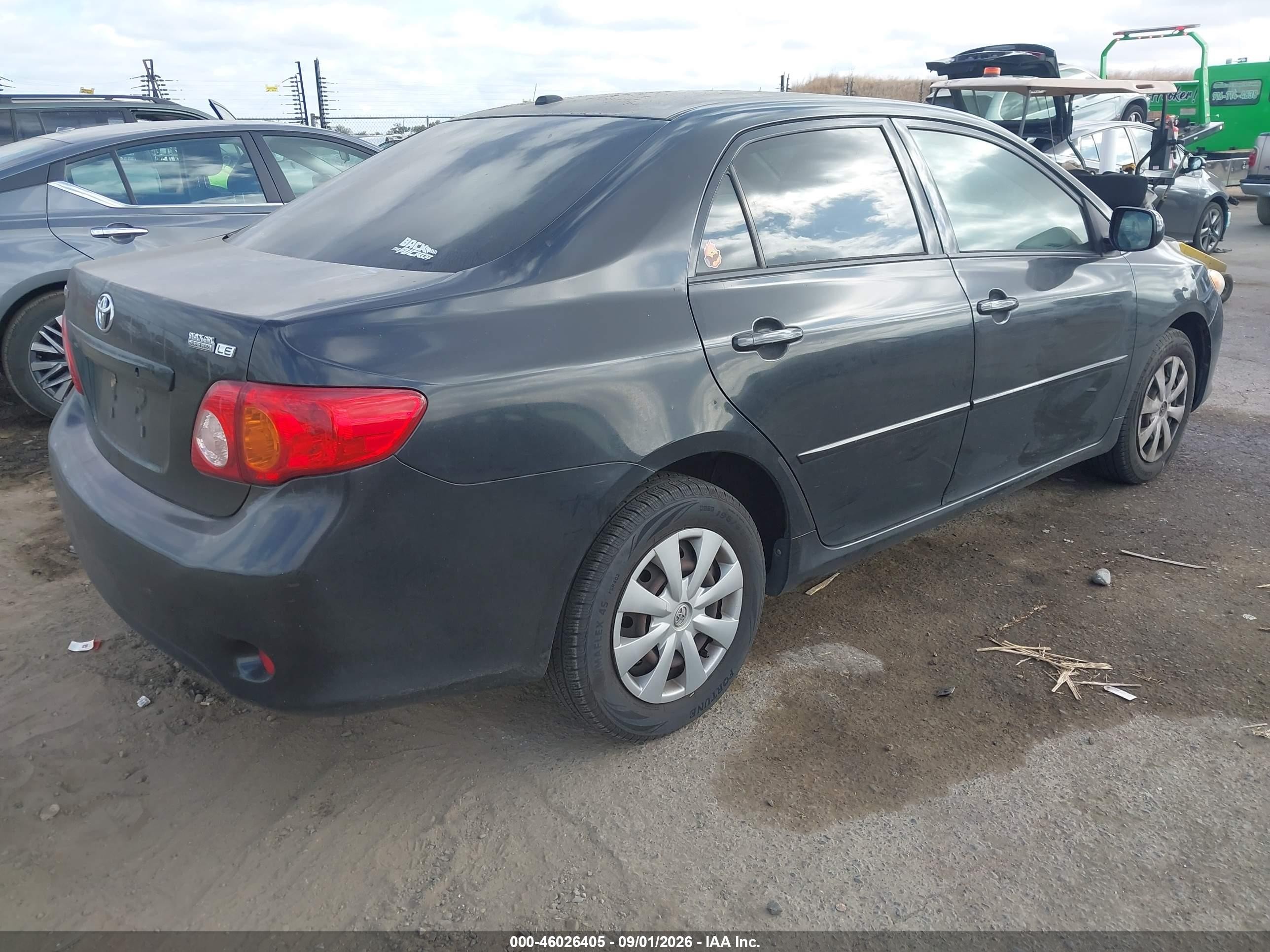 2010 Toyota Corolla Le Black vin: JTDBU4EE6AJ070171