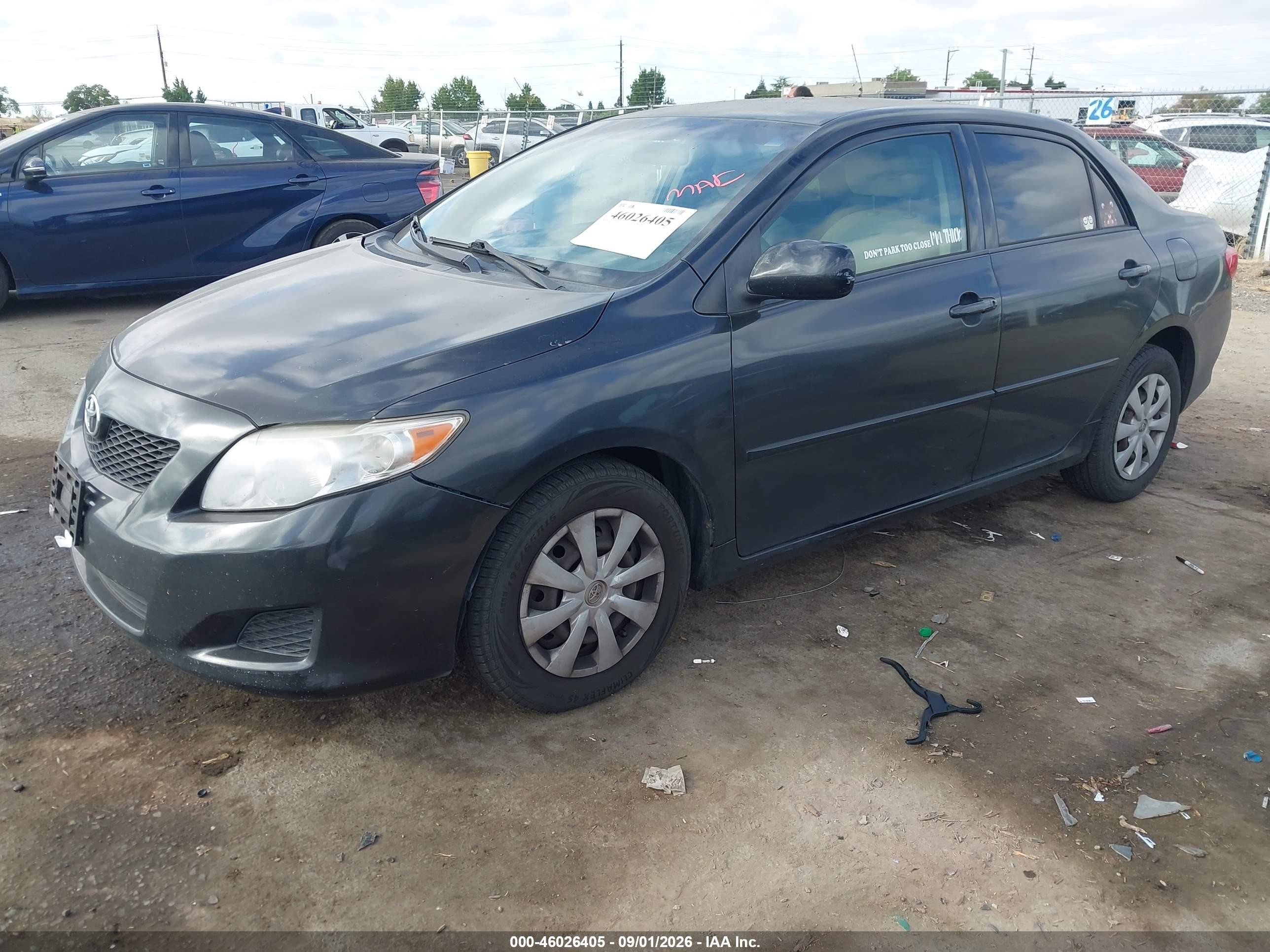 2010 Toyota Corolla Le Black vin: JTDBU4EE6AJ070171