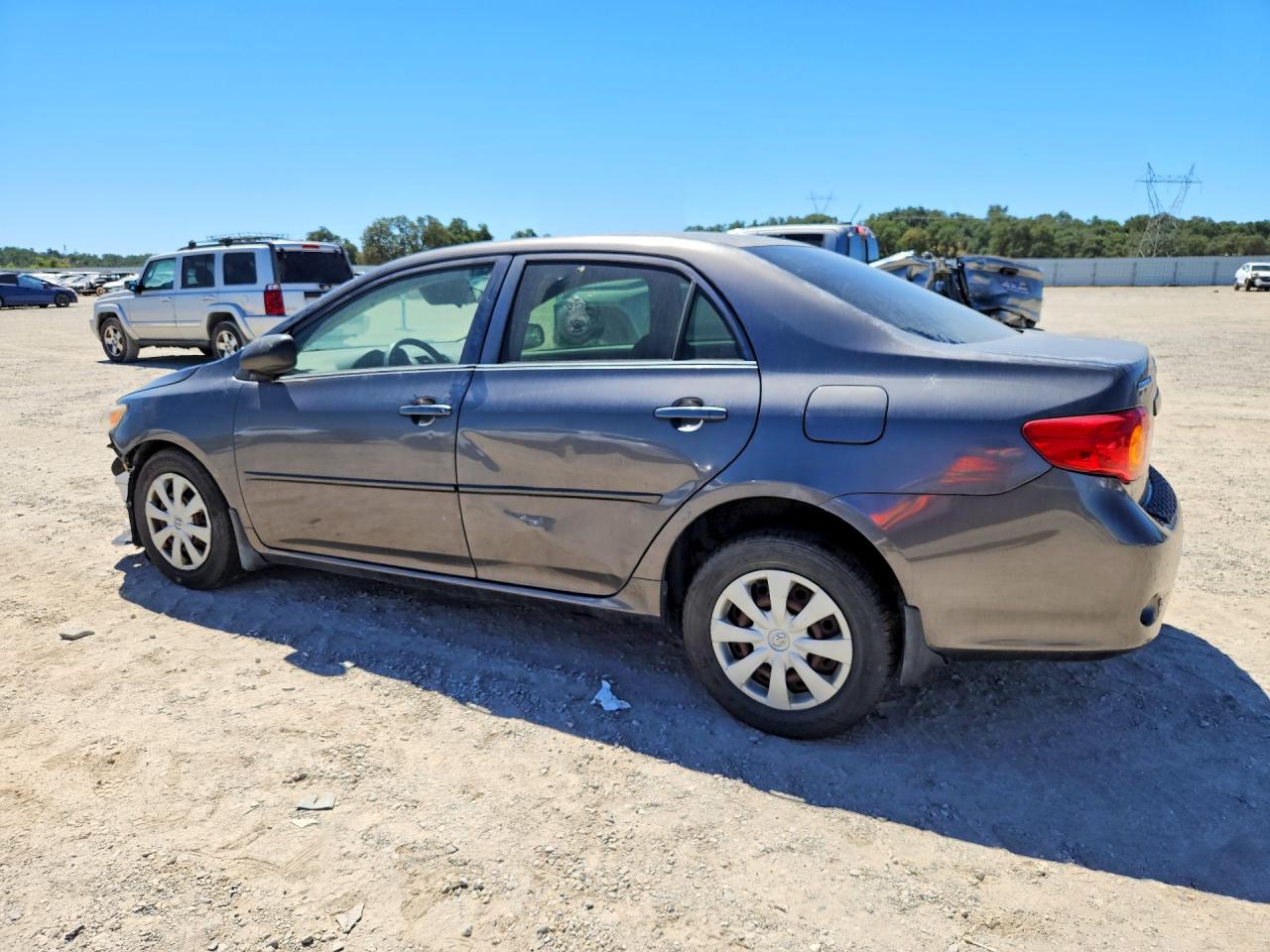 2010 Toyota Corolla Le Gray vin: JTDBU4EE6AJ072793