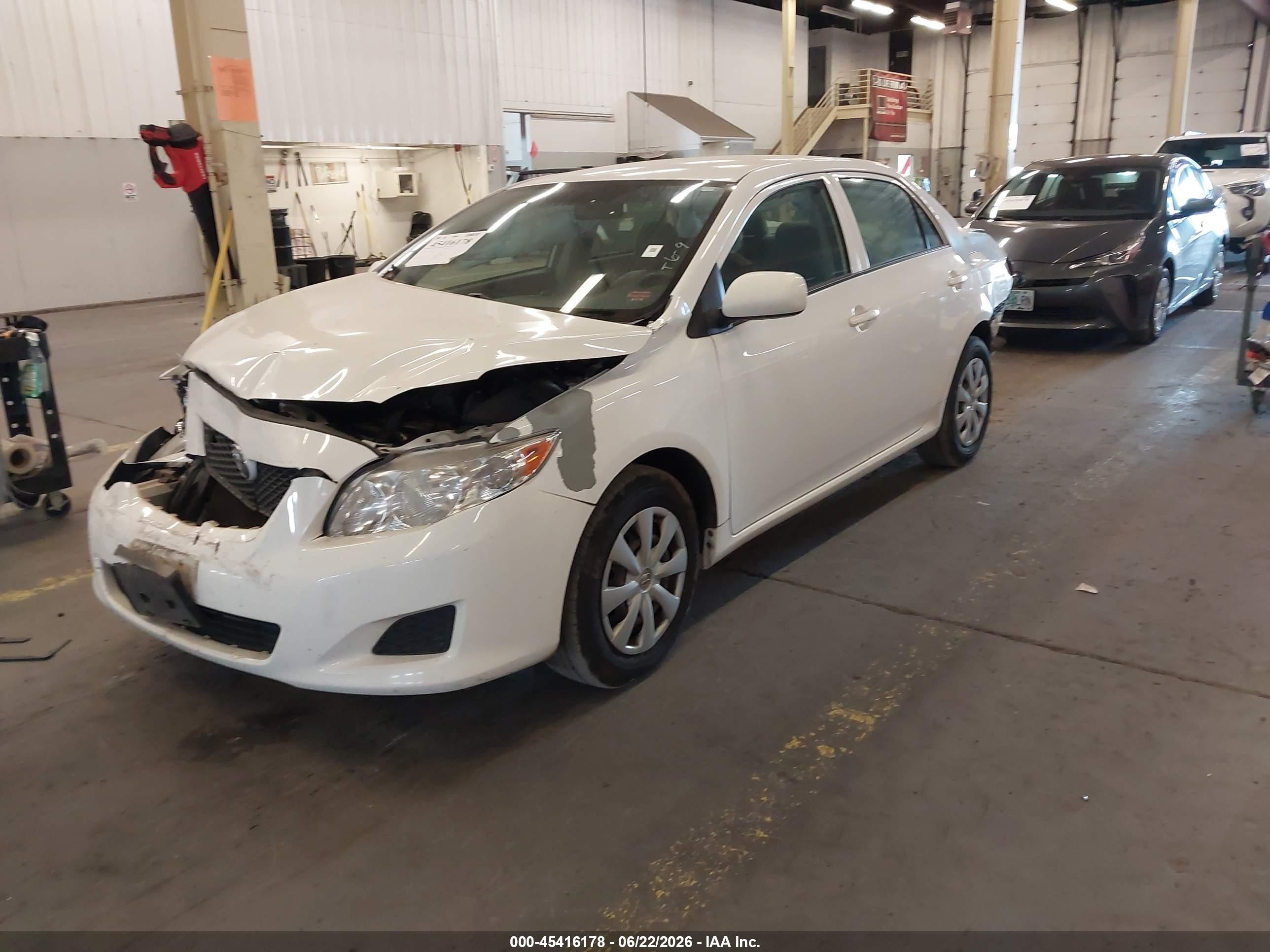 2010 Toyota Corolla Le White vin: JTDBU4EE6AJ079131