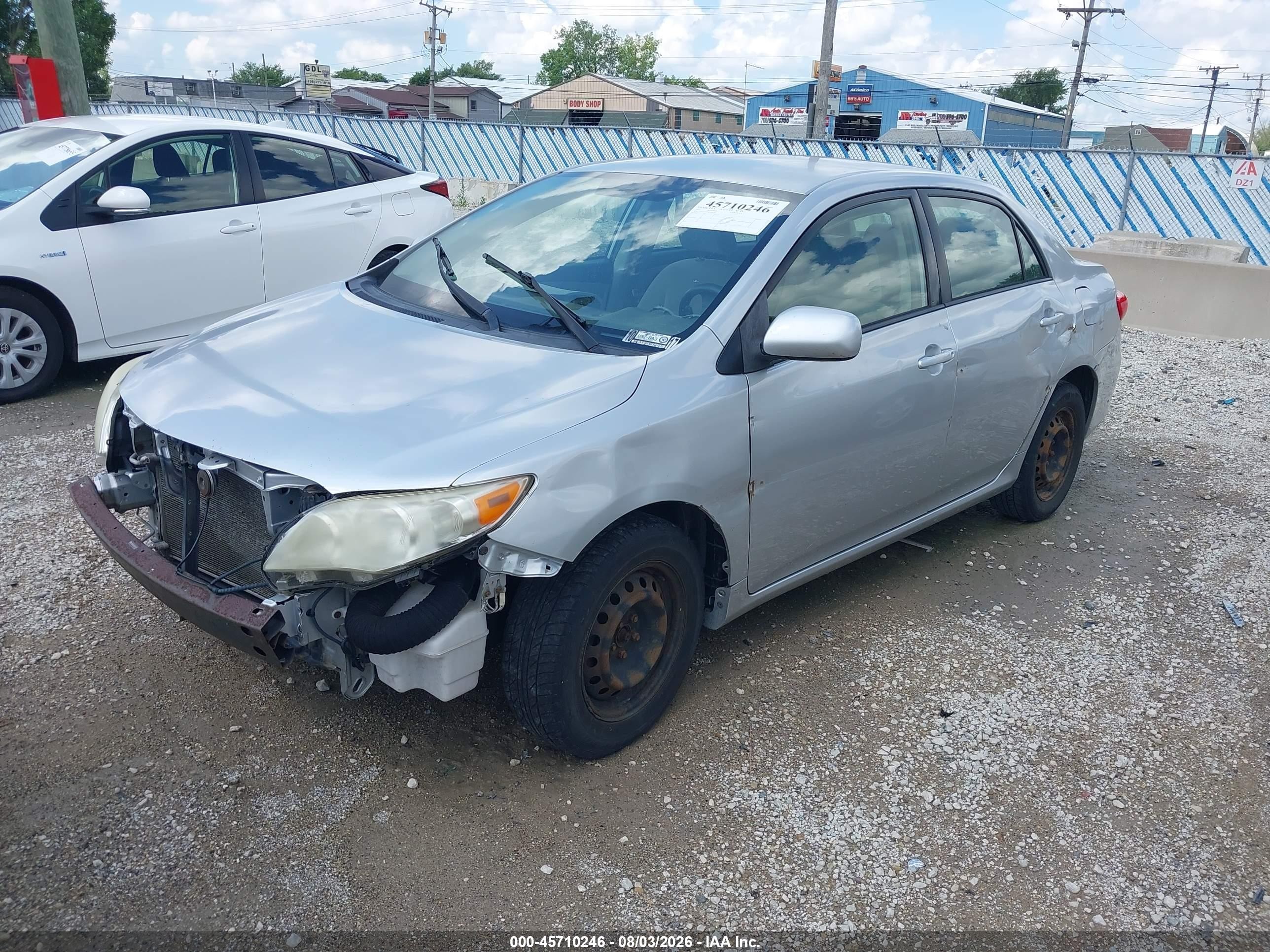 2011 Toyota Corolla Le Silver vin: JTDBU4EE6B9169138