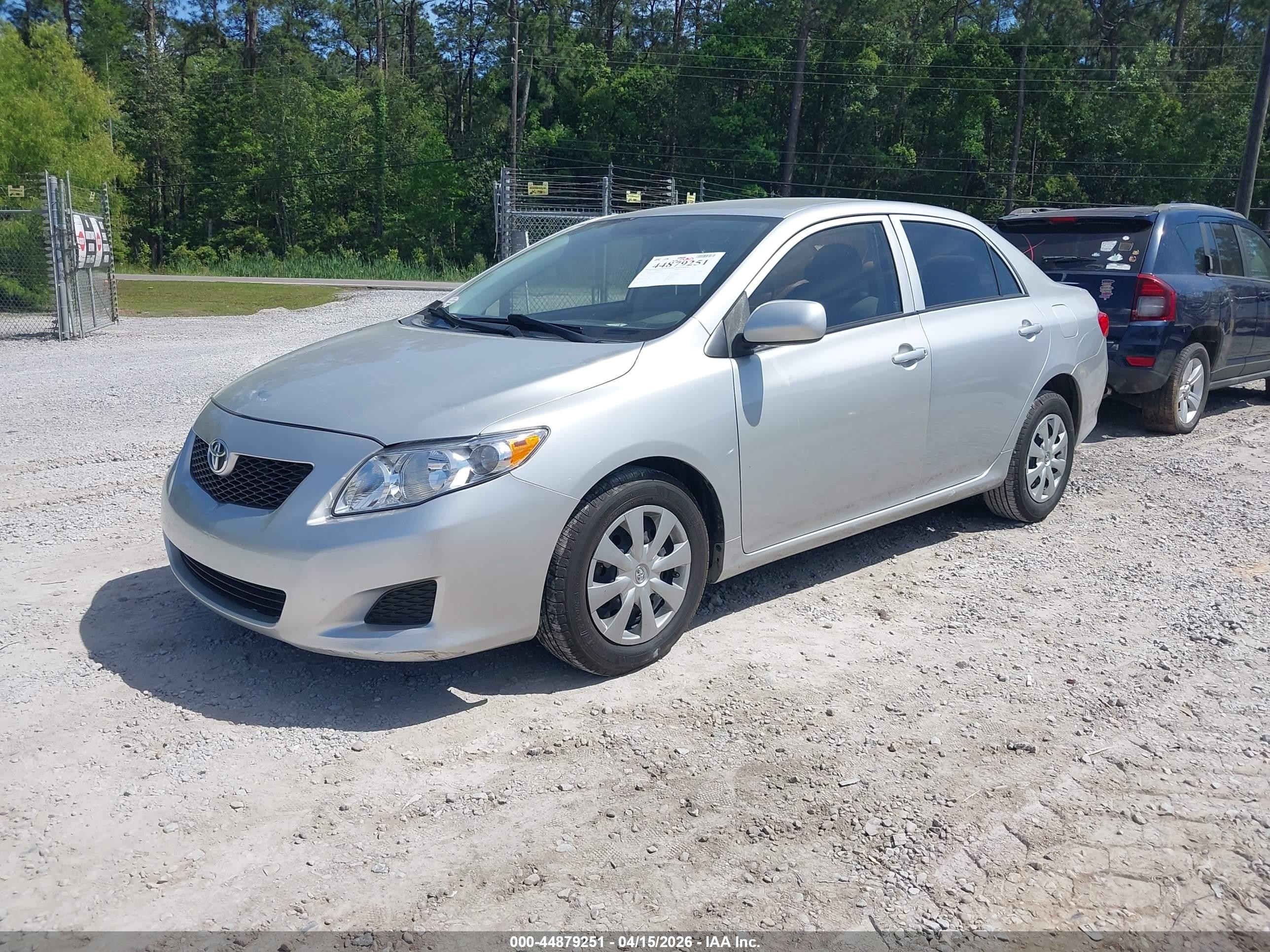 2010 Toyota Corolla Le Silver vin: JTDBU4EE7A9103972