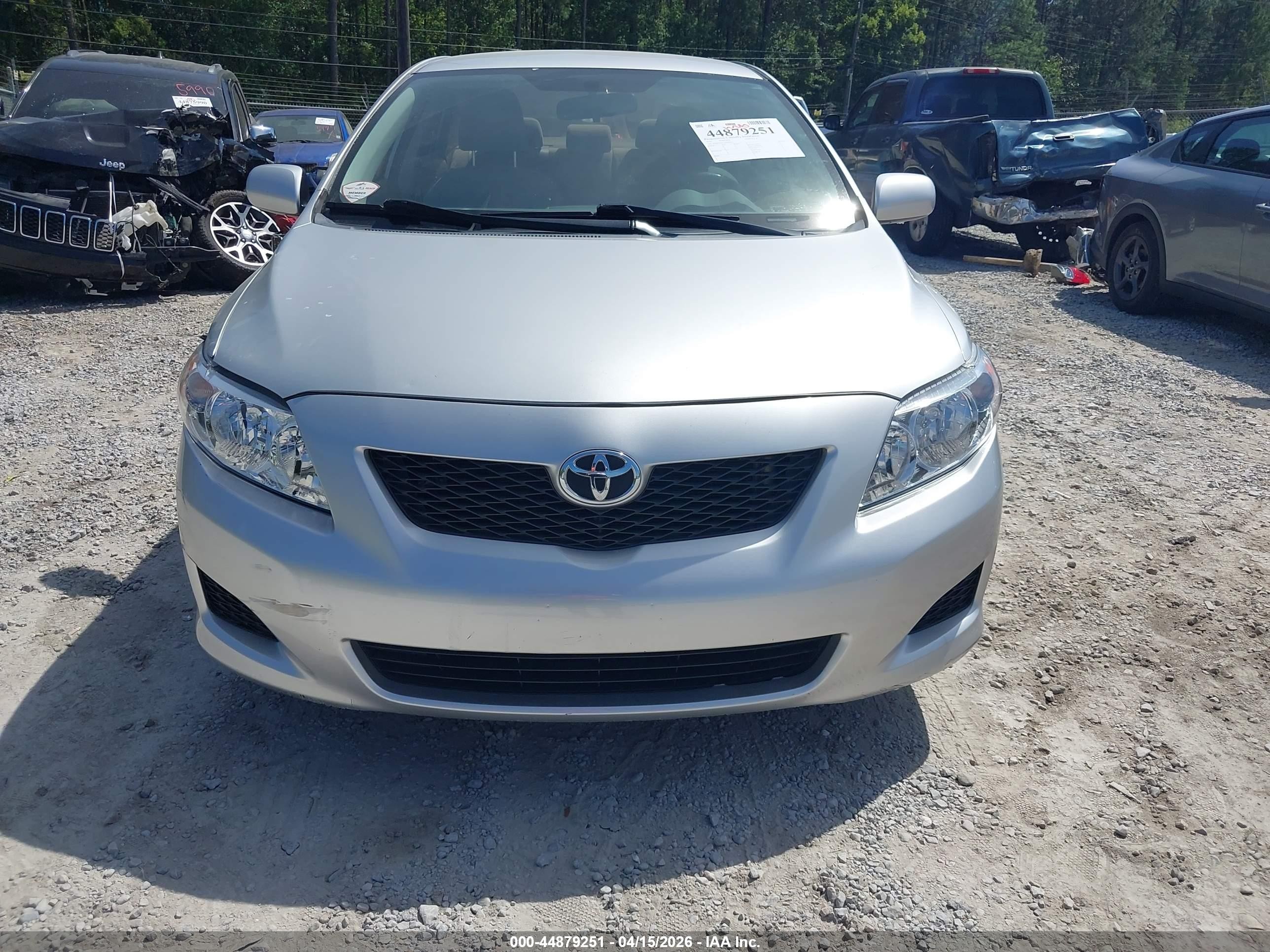2010 Toyota Corolla Le Silver vin: JTDBU4EE7A9103972