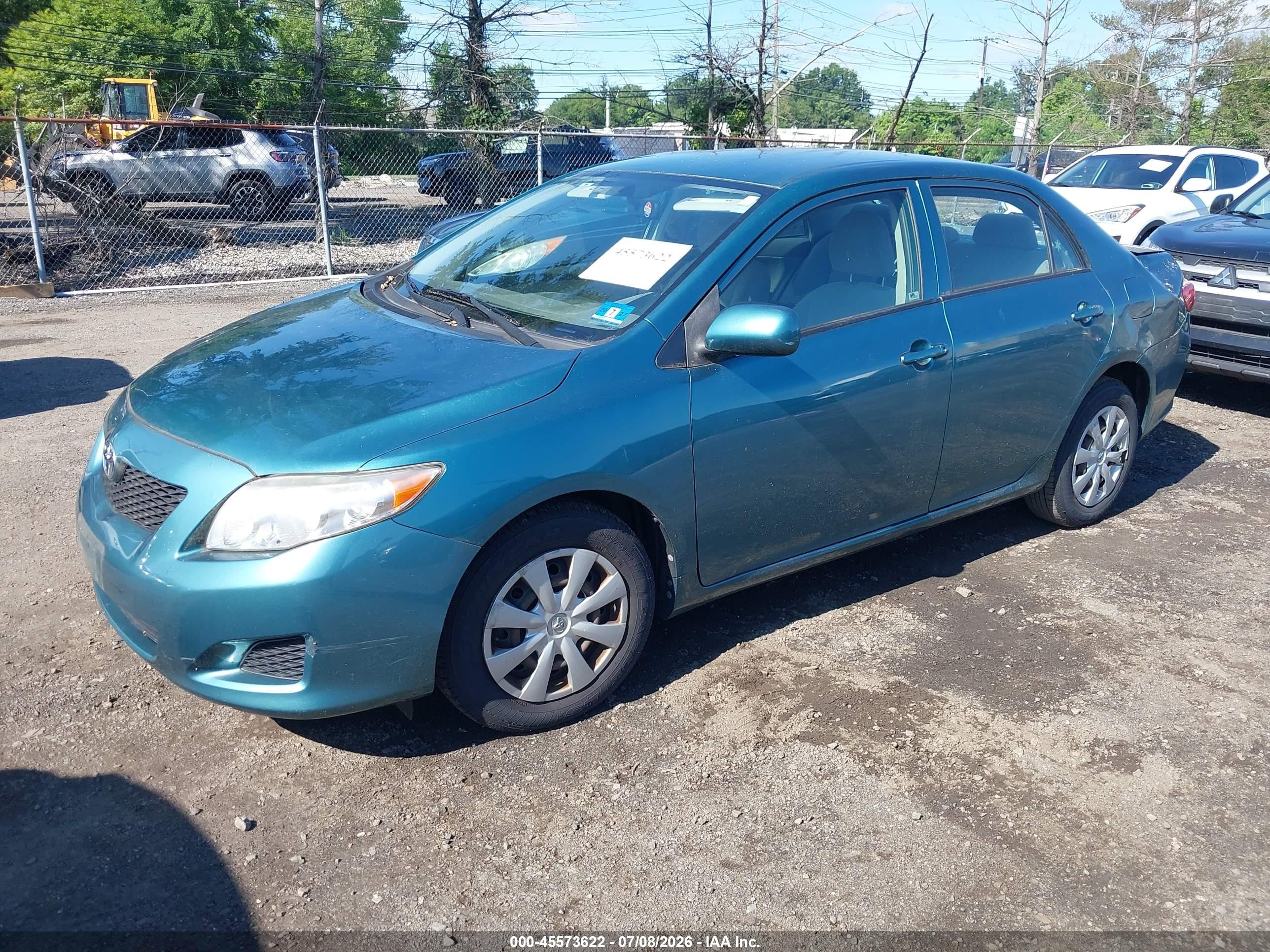 2010 Toyota Corolla Le Blue vin: JTDBU4EE7A9115331