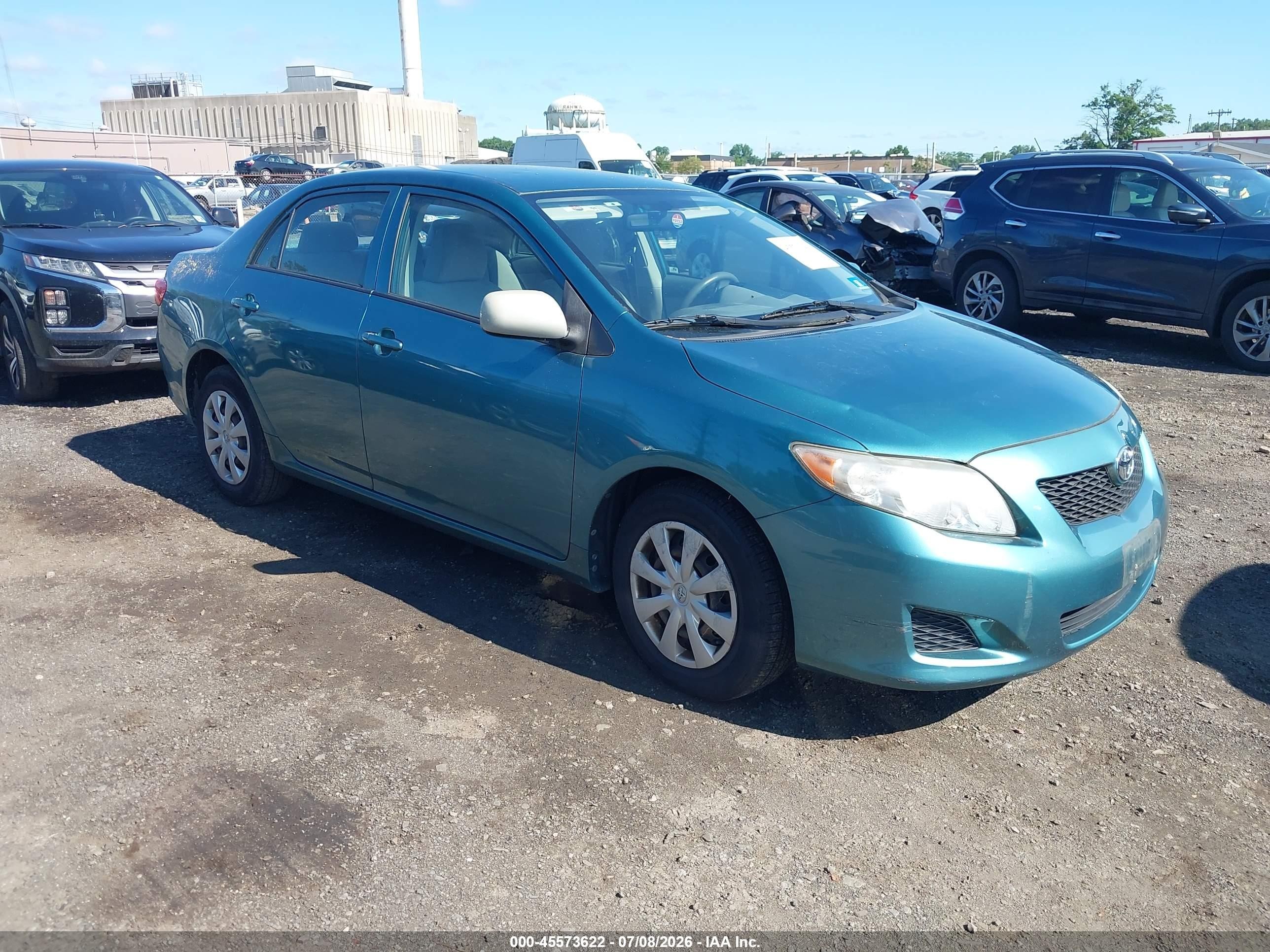 2010 Toyota Corolla Le Blue vin: JTDBU4EE7A9115331