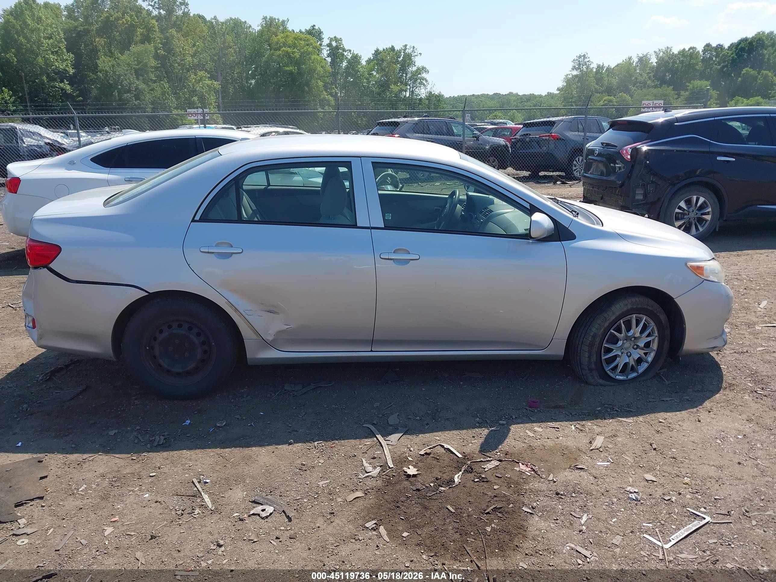 2010 Toyota Corolla Le Silver vin: JTDBU4EE7A9117113