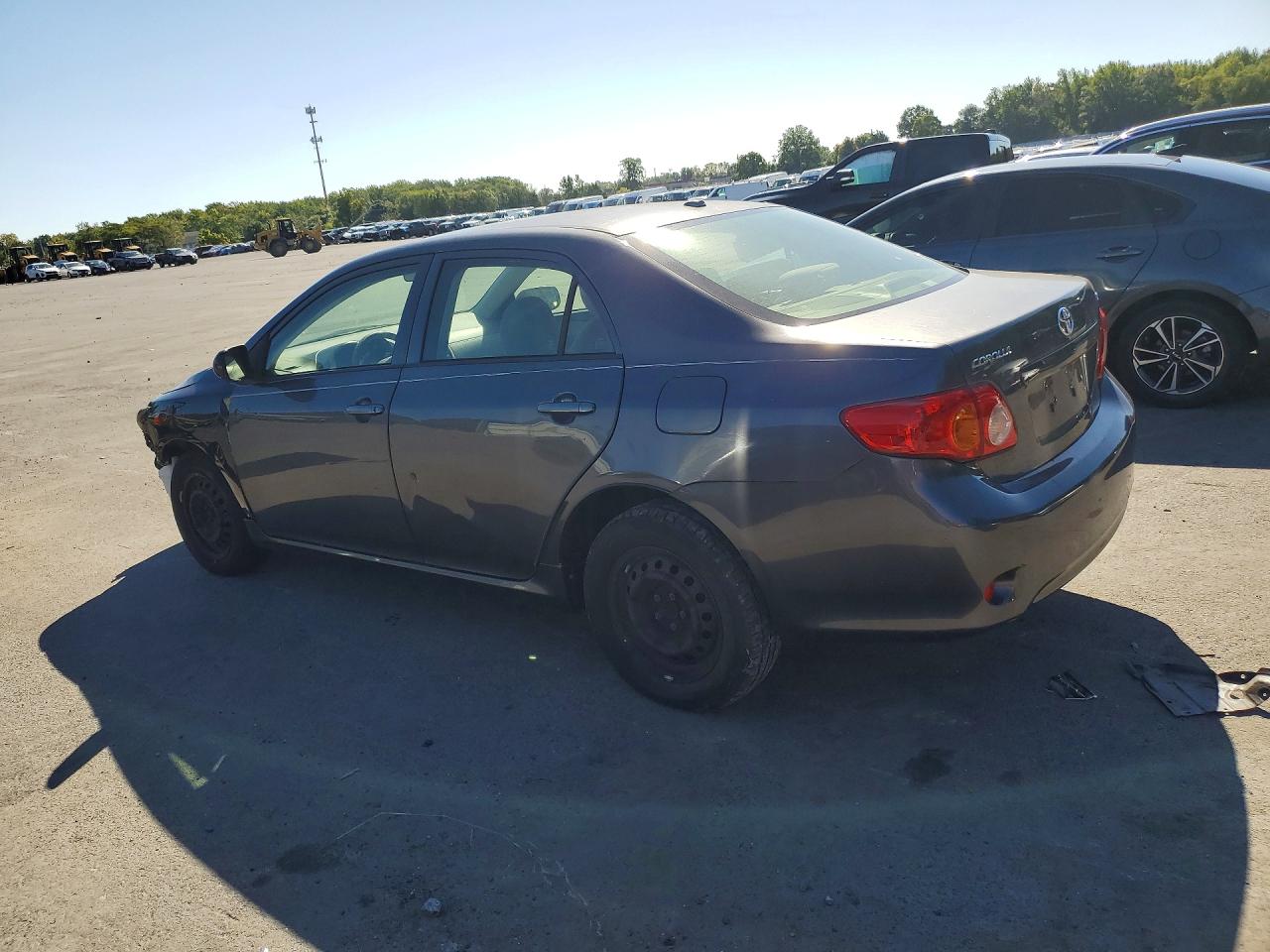 2010 Toyota Corolla Le Gray vin: JTDBU4EE7A9118049