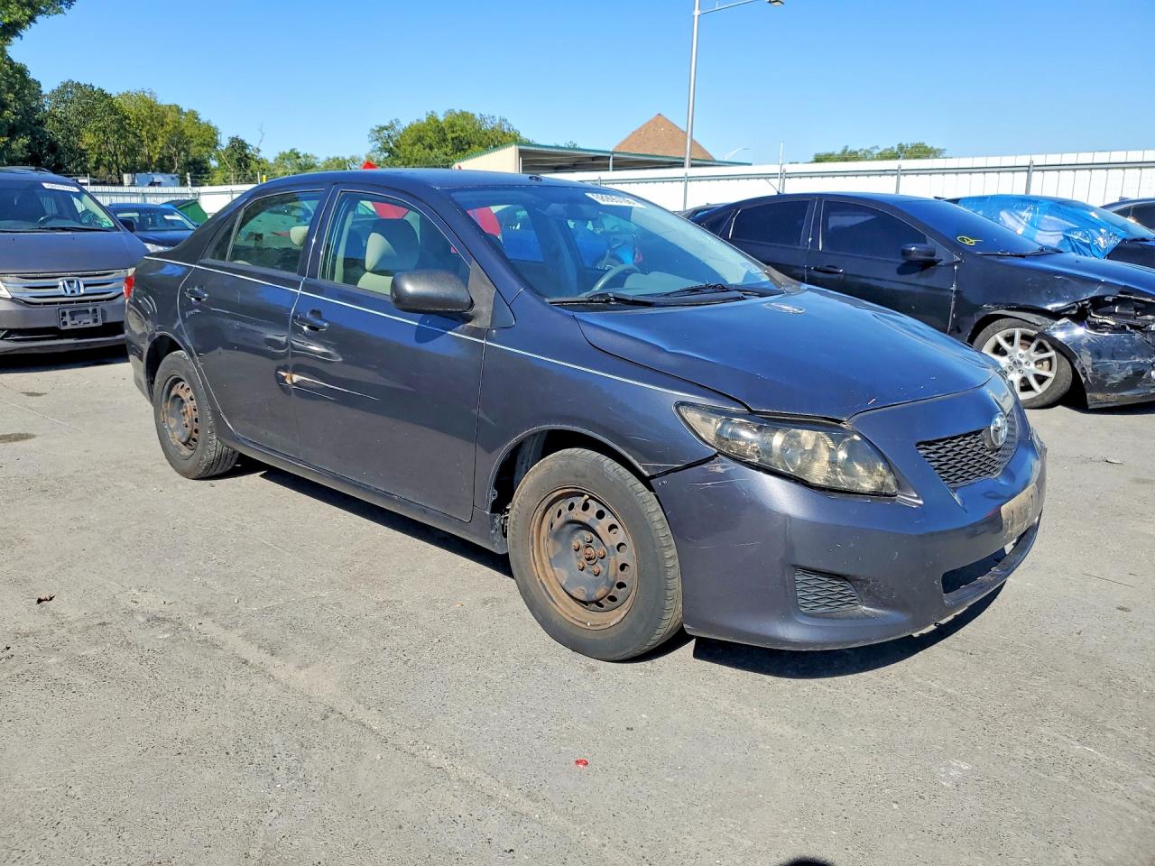 2010 Toyota Corolla Le Gray vin: JTDBU4EE7A9118049