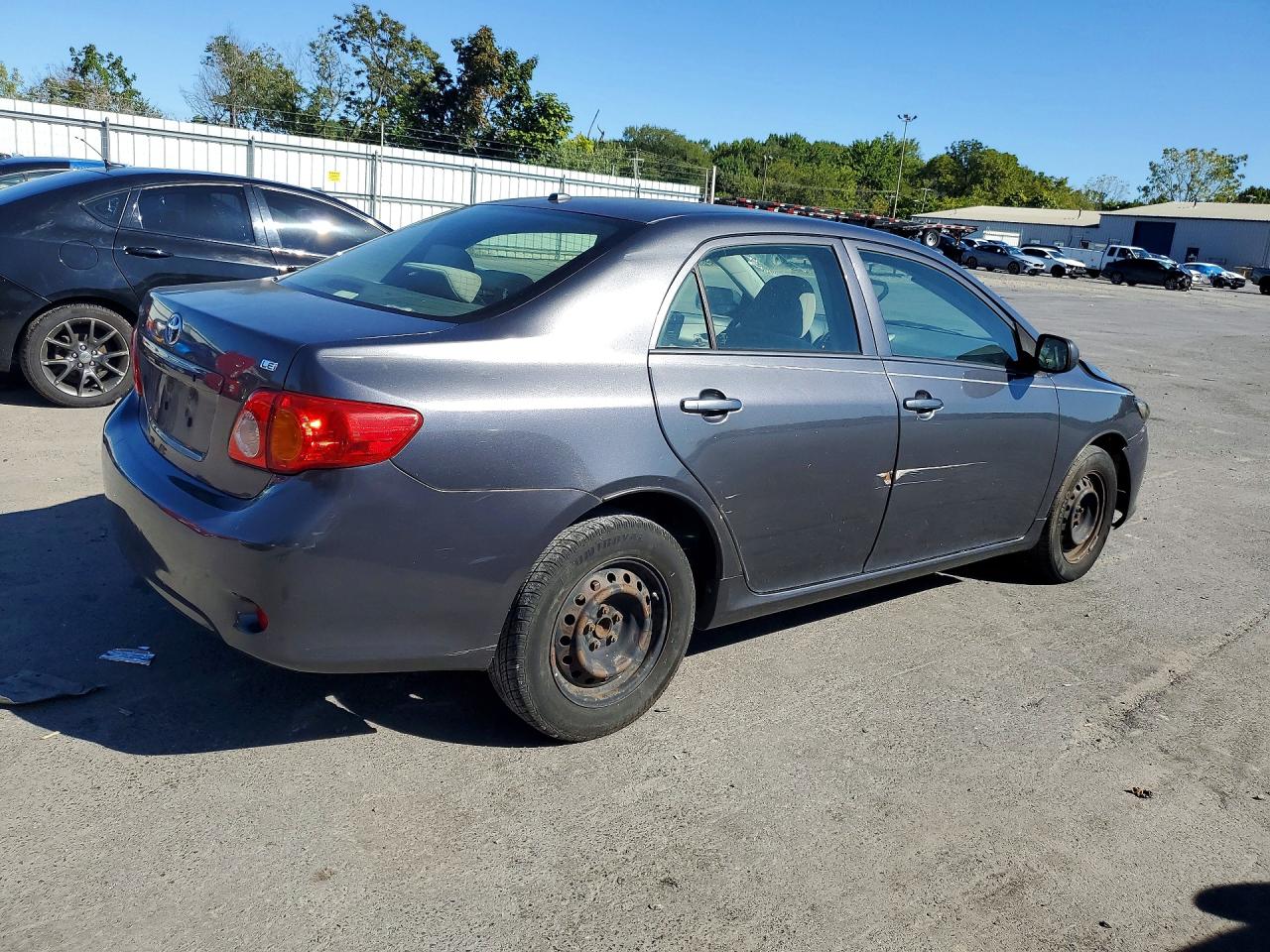 2010 Toyota Corolla Le Gray vin: JTDBU4EE7A9118049