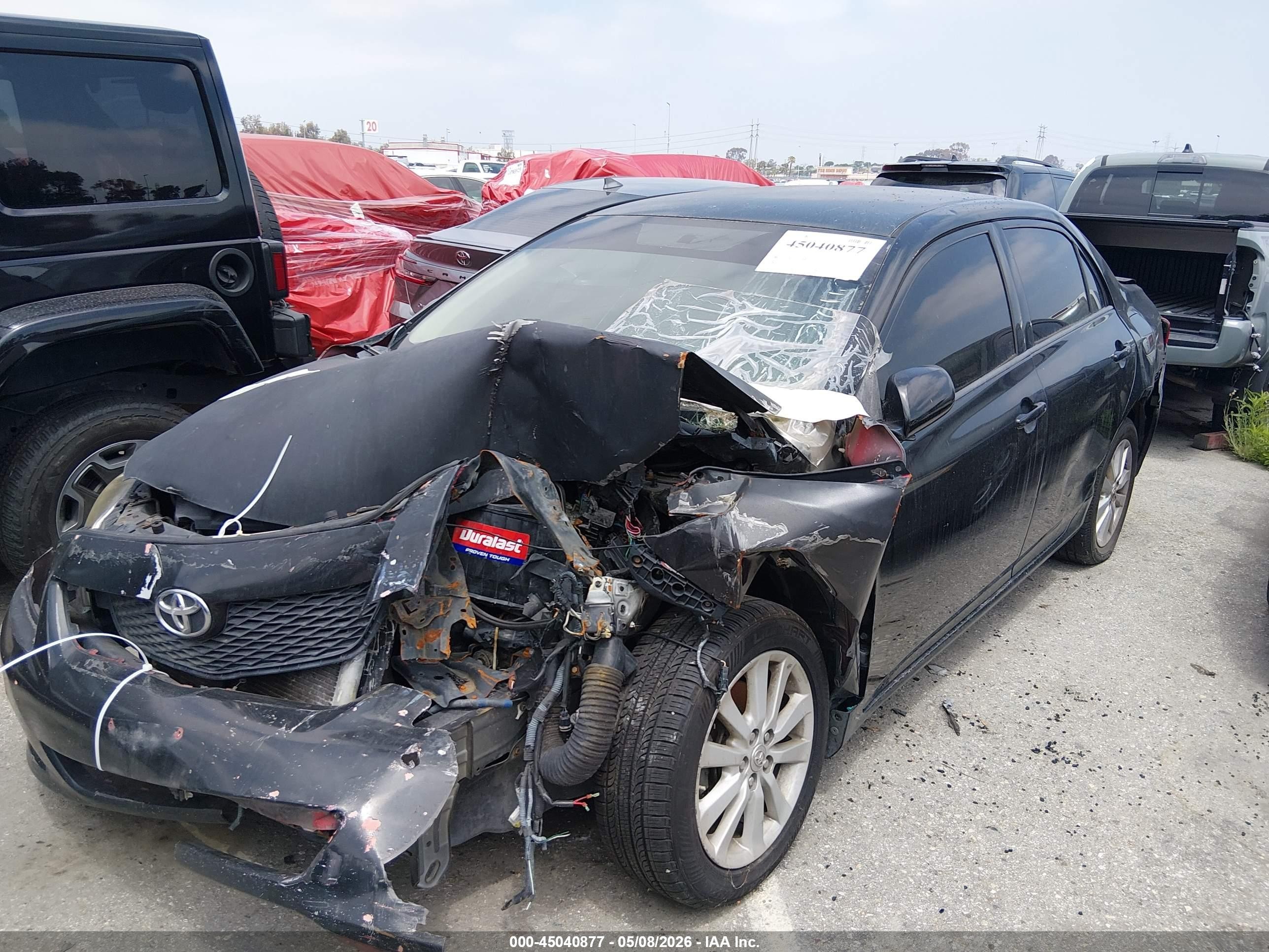 2010 Toyota Corolla Le Black vin: JTDBU4EE7AJ061303